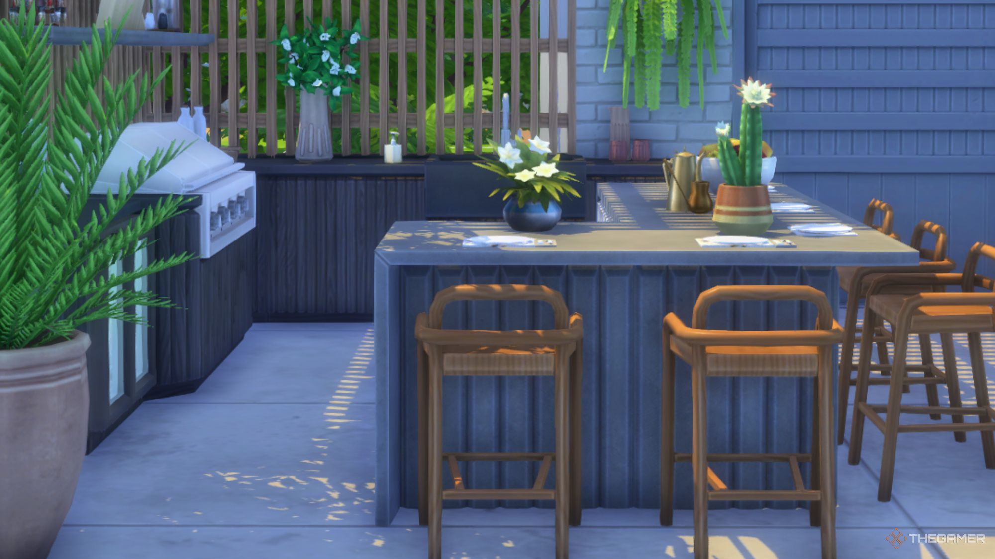 An image from the Sims 4 Outdoor Kitchen custom content set, complete with counter and stools perfect for your backyard.