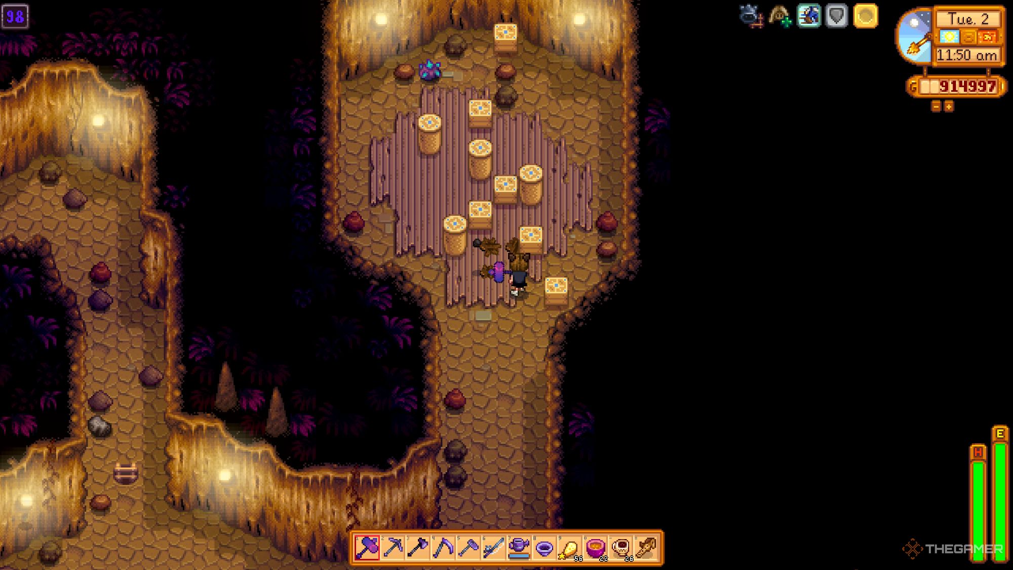 An image from Stardew Valley of the farmer breaking a barrel in the Skull Cavern, which could contain a Magic Quiver. 