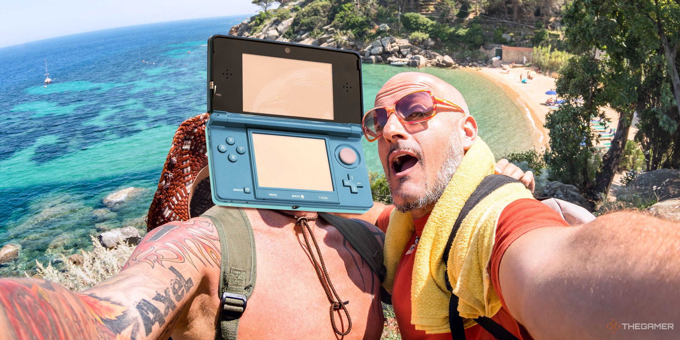 A man taking a selfie with a Nintendo 3DS