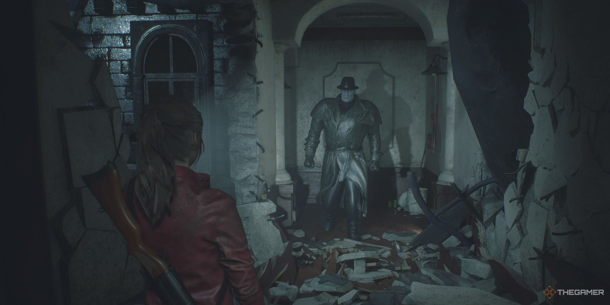 Claire Redfield confronting Mr. X in a dark crumbling building.