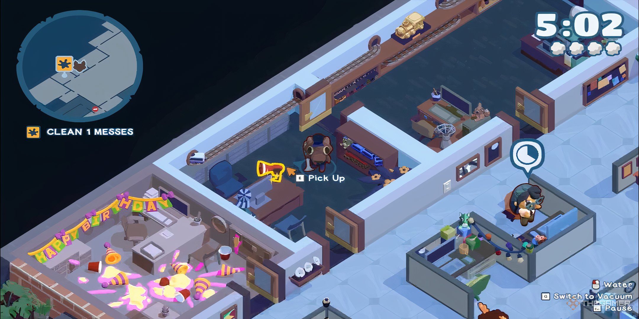 Kyle standing beside an office desk with a megaphone on the floor nearby.