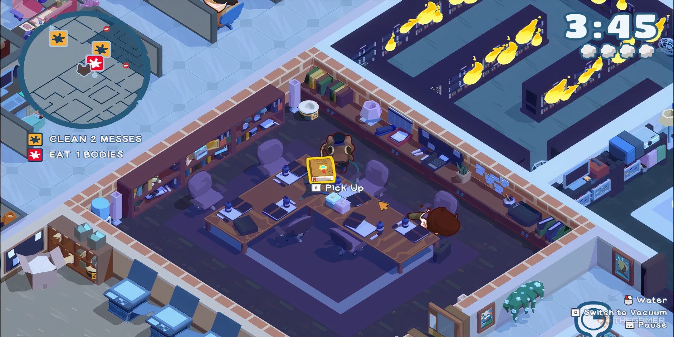 Kyle standing in a large office with a book on the desk in front of him.