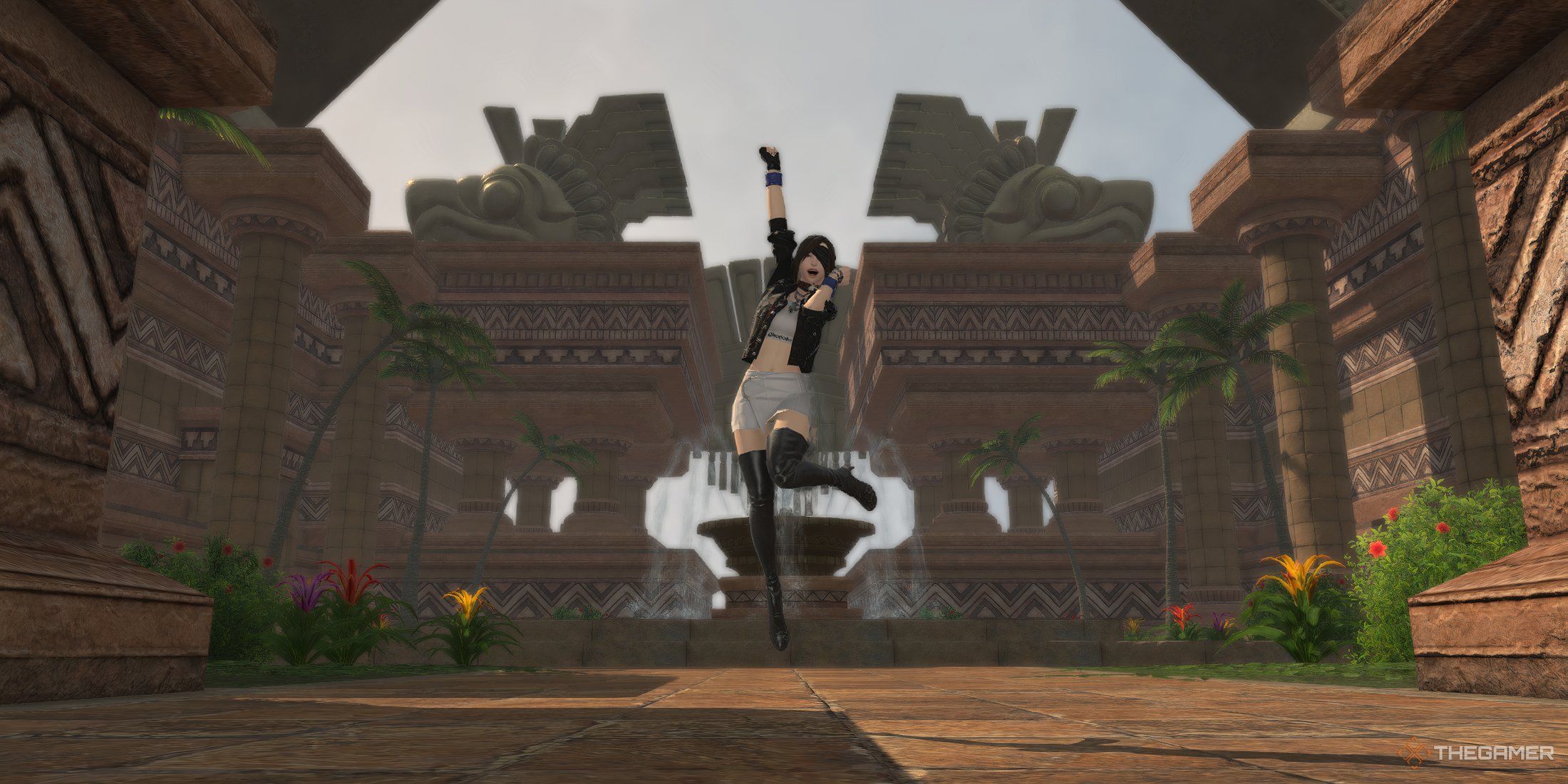 A player celebrating at the top of Pinion's Reach in Tuliyollal in Final Fantasy 14 Dawntrail.