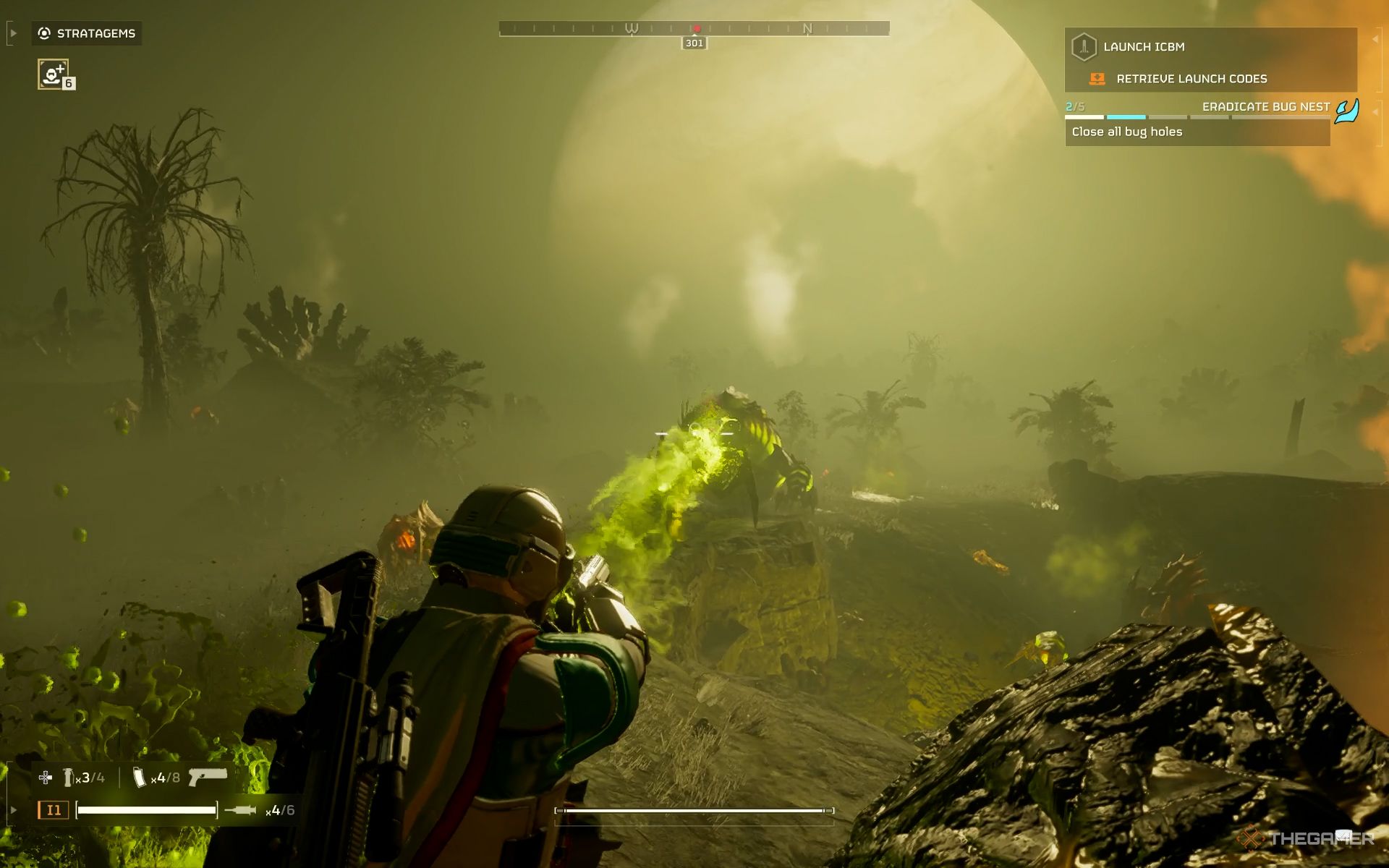بازیکنی که در helldivers 2 با تپانچه با نارنجک به سمت یک دستگاه صفراوی شلیک می کند