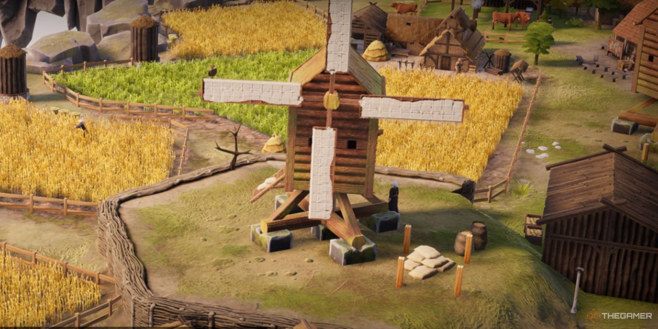 a windmill surrounded by wheat fields on the loading screen of terrascape.