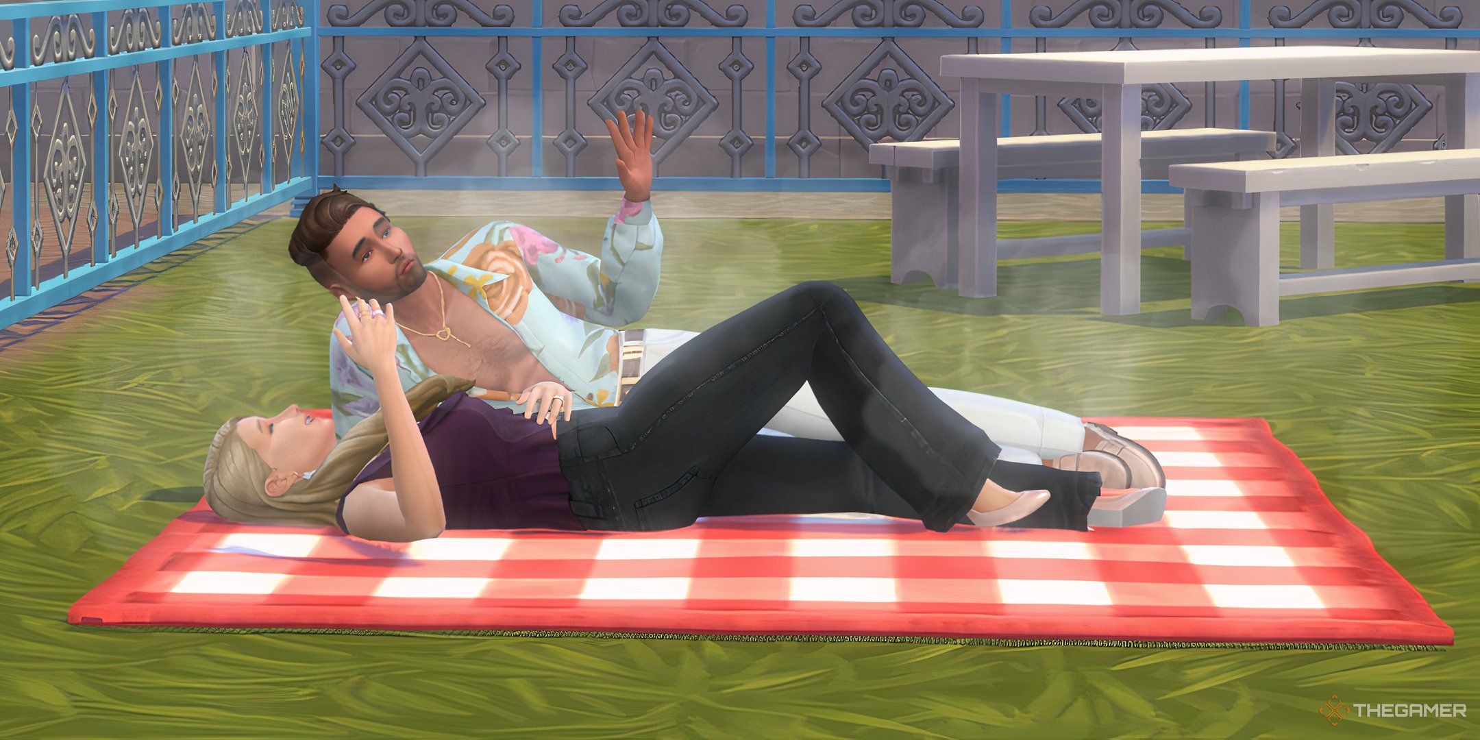 The Sims 4 lovestruck couple on a picnic blanket