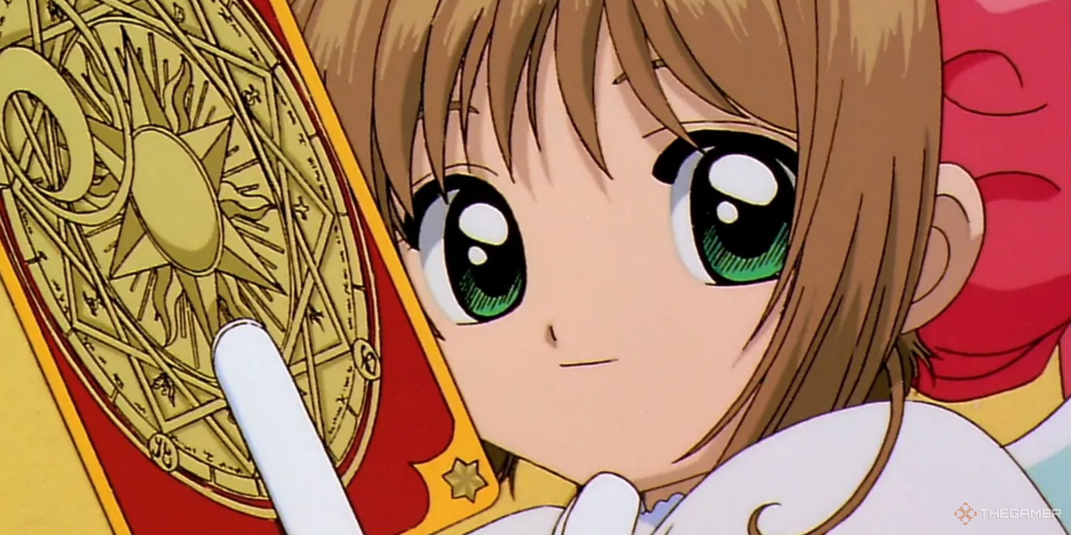 Cardcaptor Sakura is holding a clow card.
