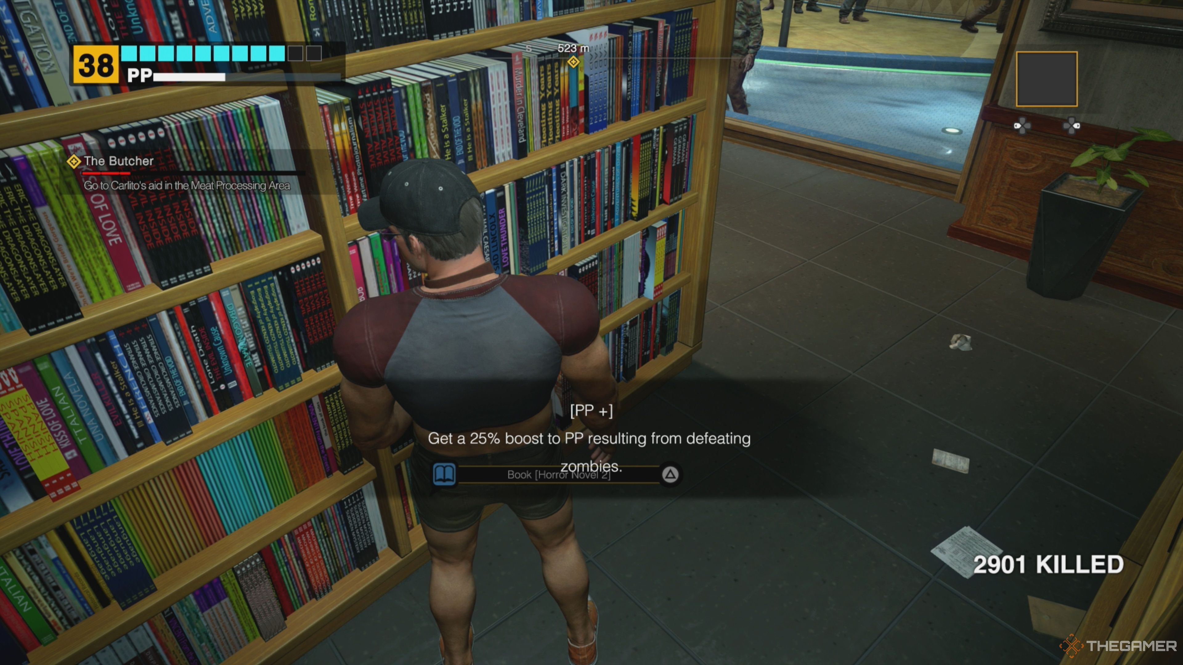 Frank West picking up the Horror Novel 2 Book, granting him a 25 percent boost to PP when defeating zombies in Dead Rising Deluxe Remaster.