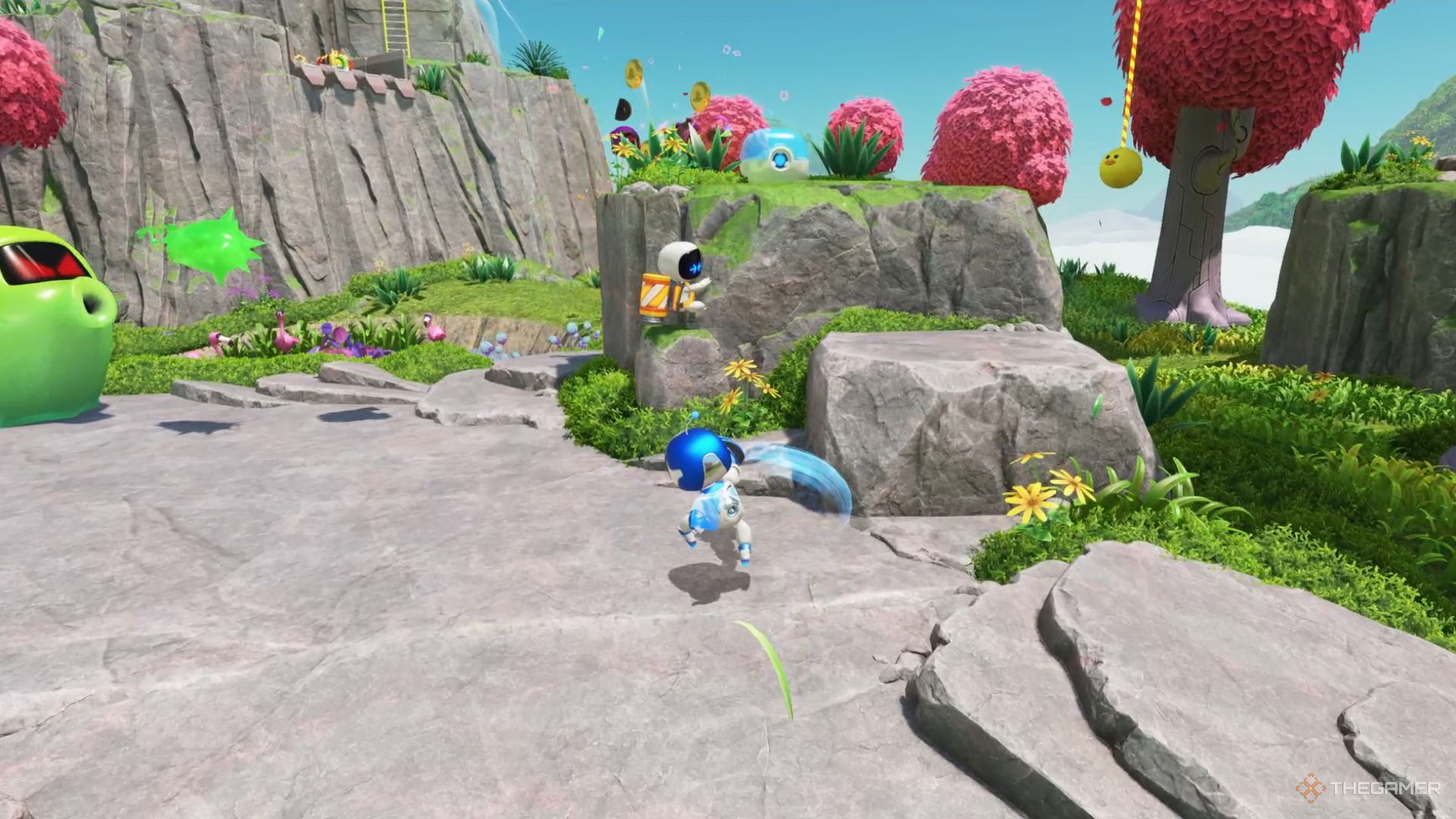 Astro Bot. The Sky Garden Level. The second bot, clingling to a bolder.