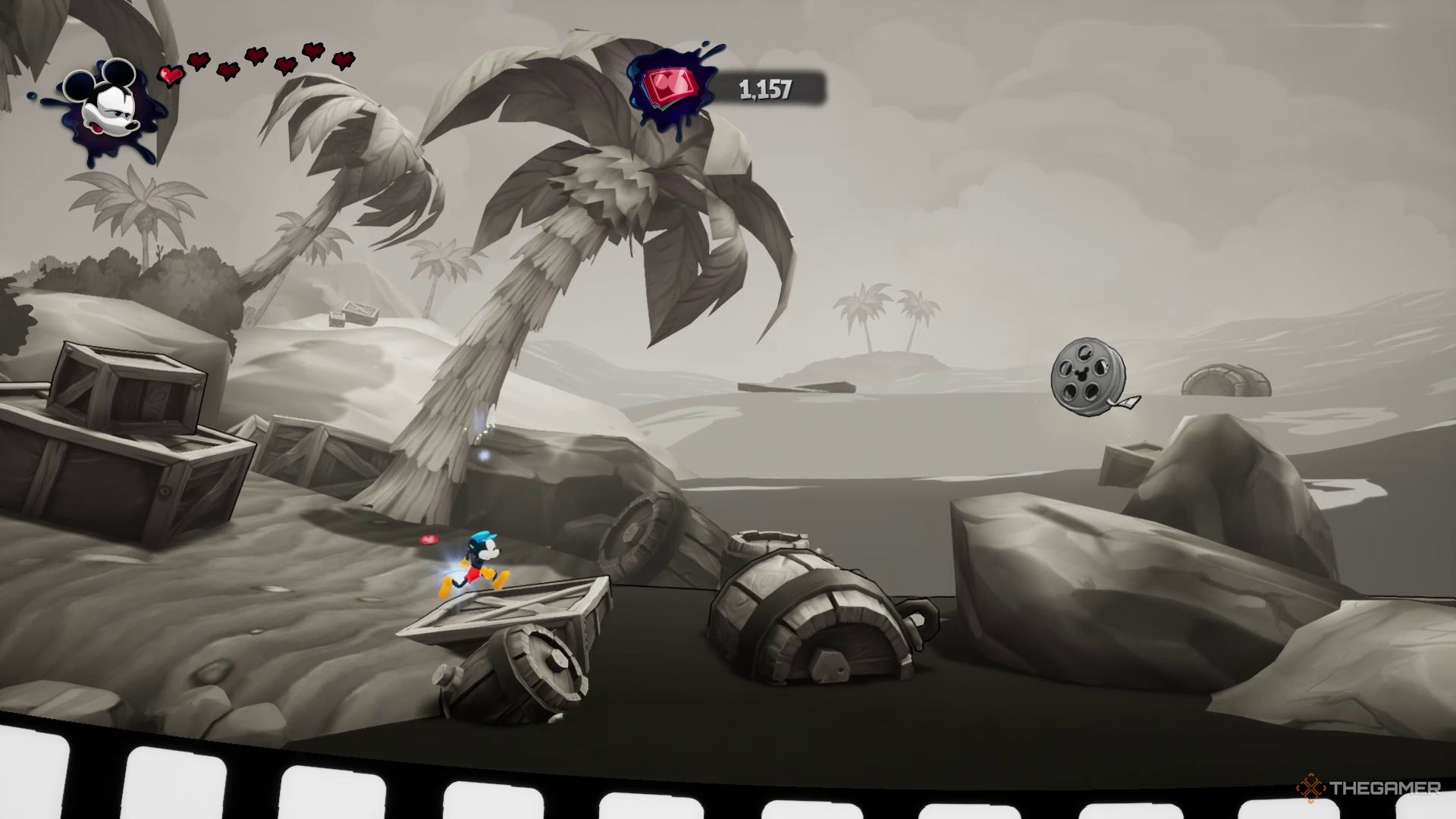 میکی در حال نزدیک شدن به دومین حلقه فیلم در Castaway قسمت دوم در Disney Epic Mickey: Rebrushed.