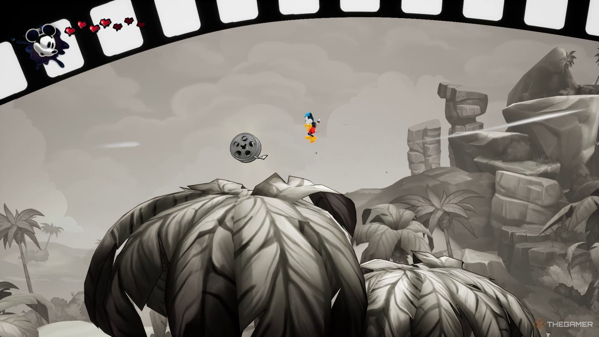 میکی در نزدیکی اولین فیلم حلقه در Castaway قسمت اول در Disney Epic Mickey: Rebrushed.
