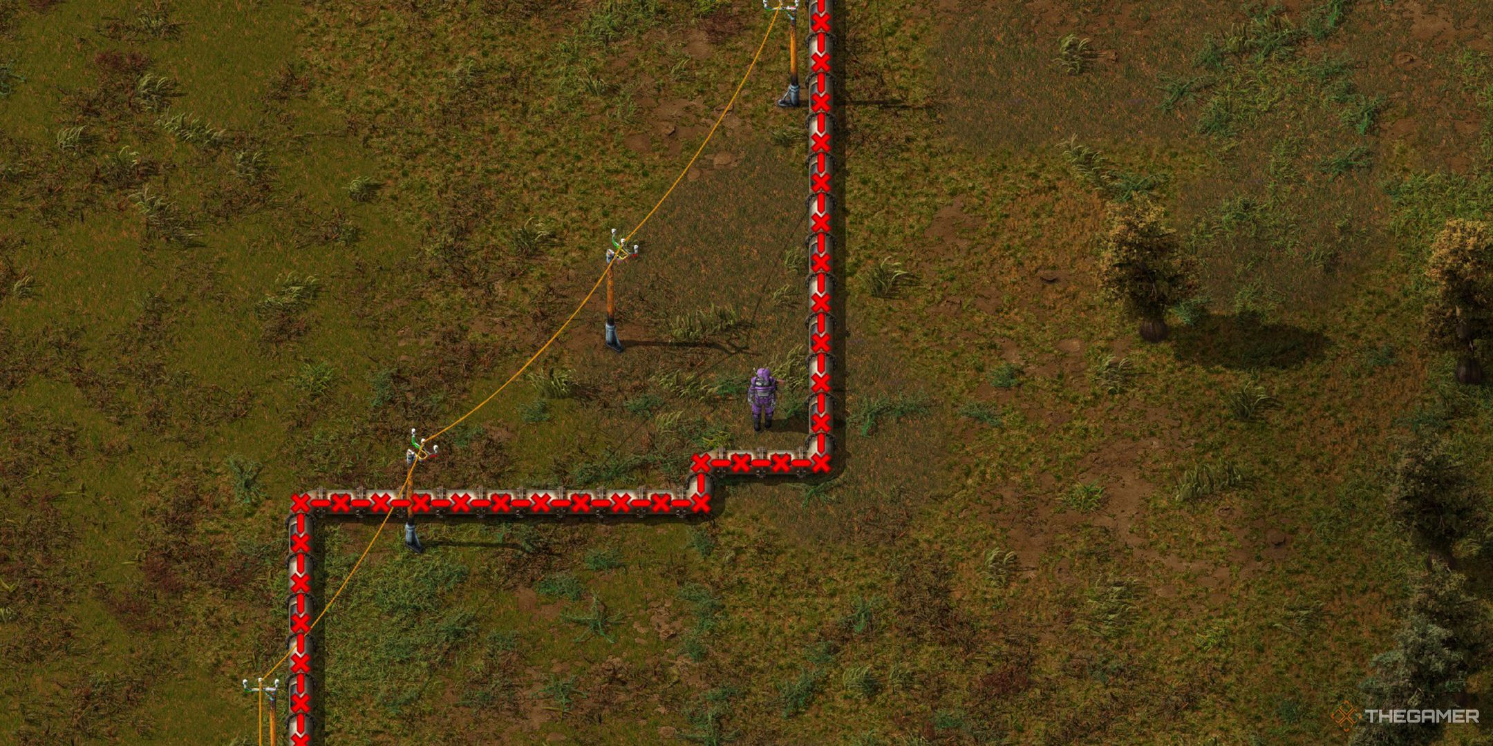 The player standing next to a series of overextended pipelines, indicated by a red warning X.