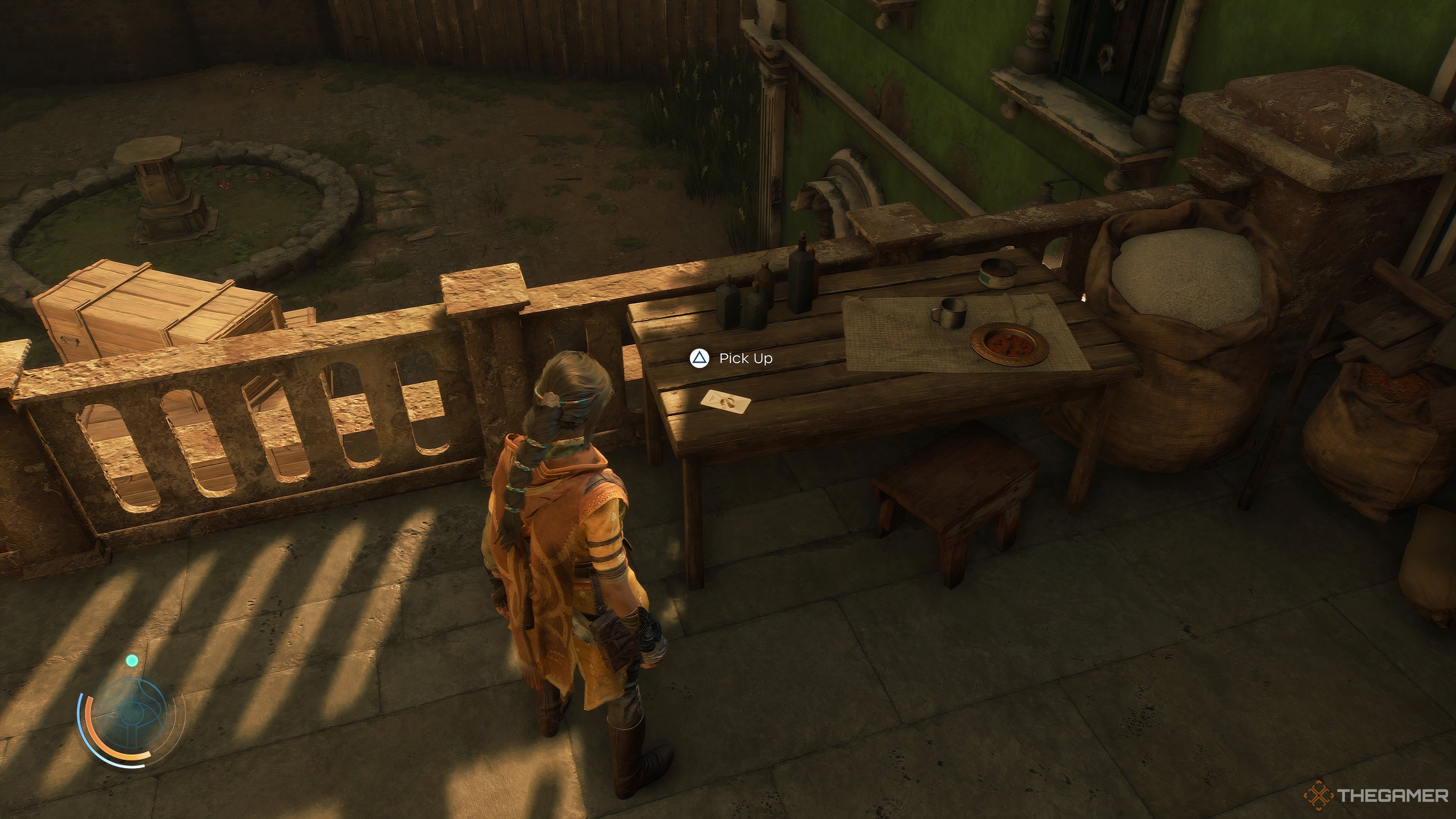 Haroona standing by an Ascension Card on a wooden table in Unknown 9: Awakening.