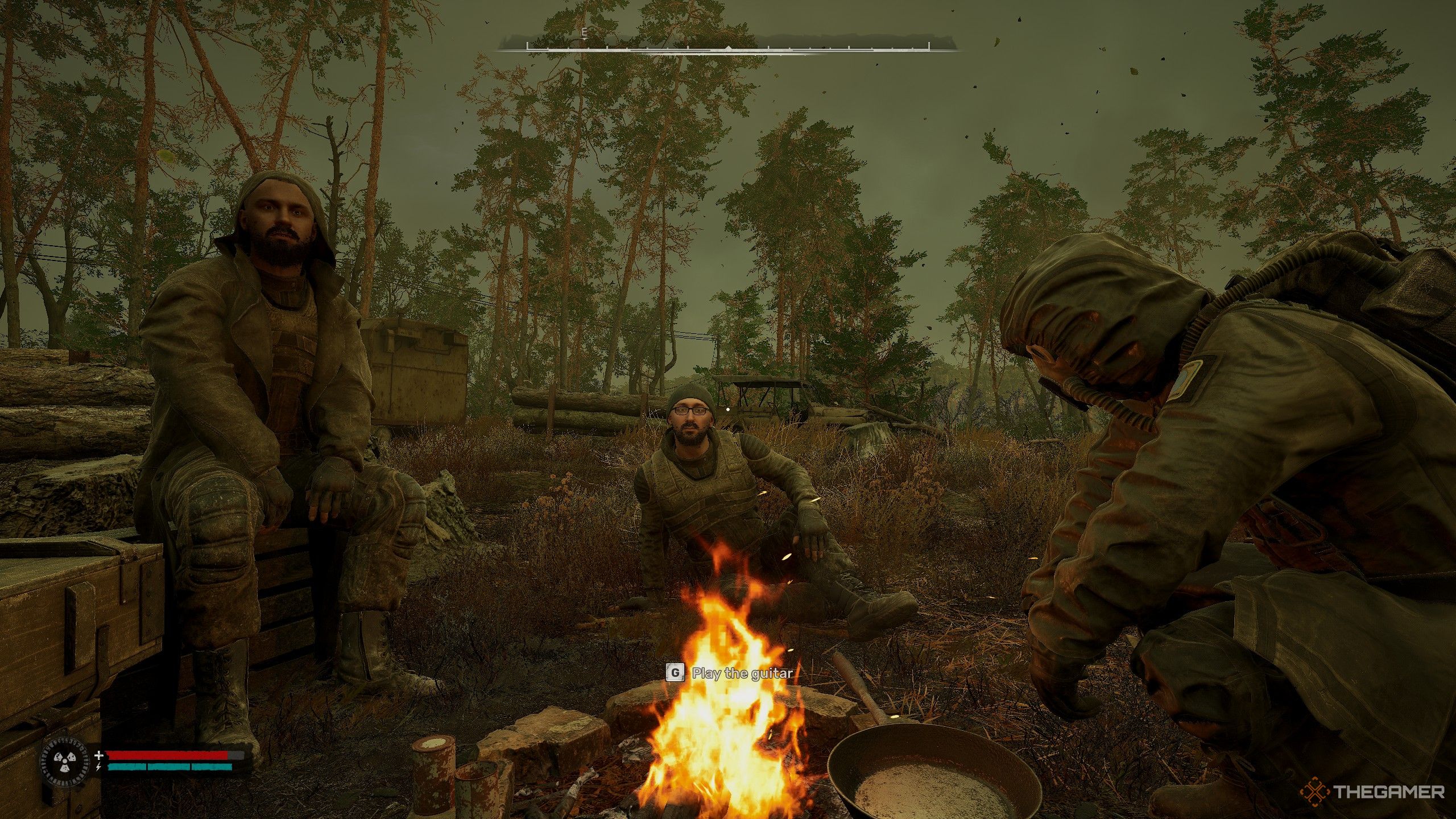 A group of Stalkers sit around a campfire in an overcast field in Stalker 2.