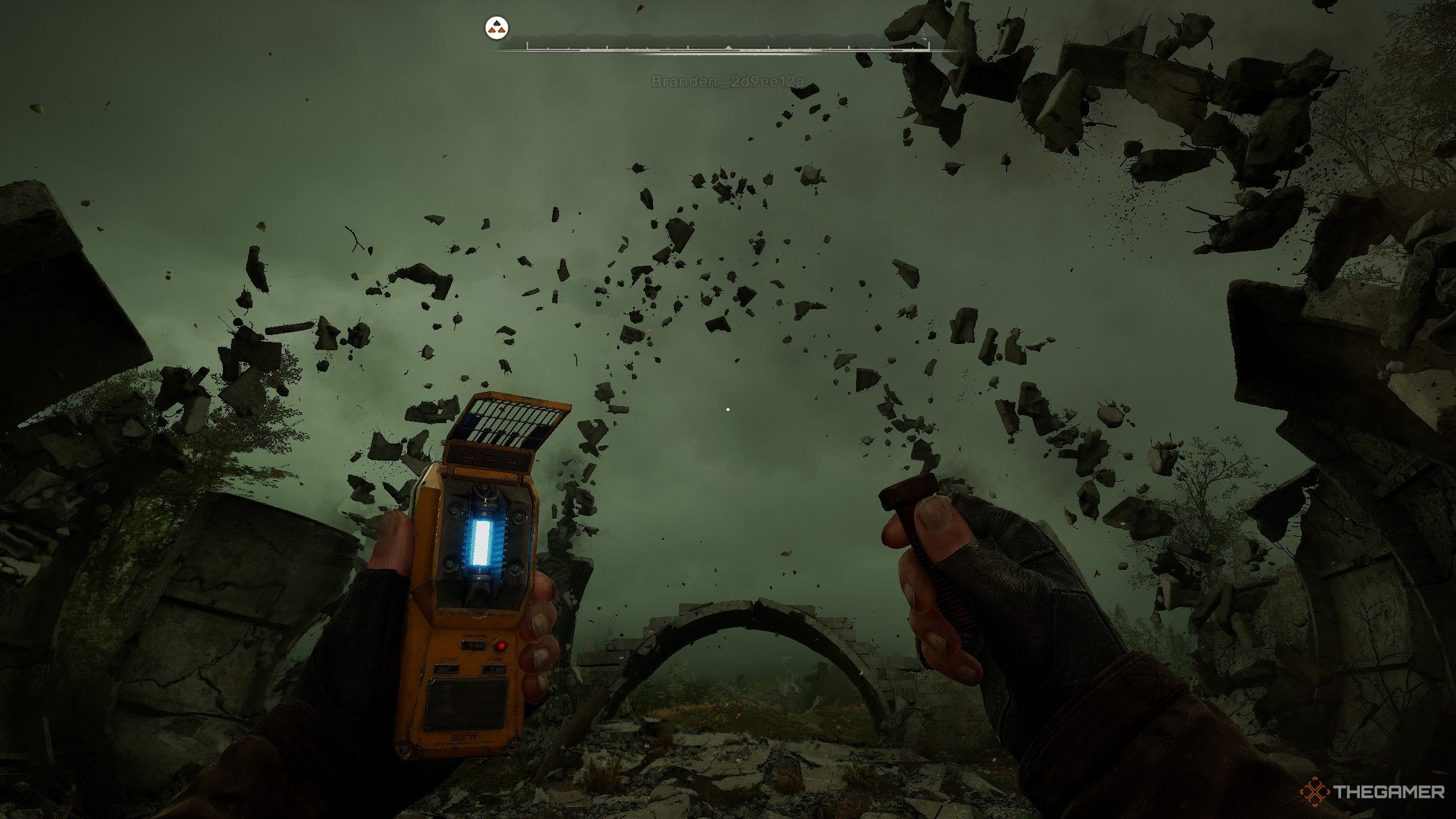 Stalke 2: Heart of Chornobyl gameplay of a levitating belt of rocks making an arch.