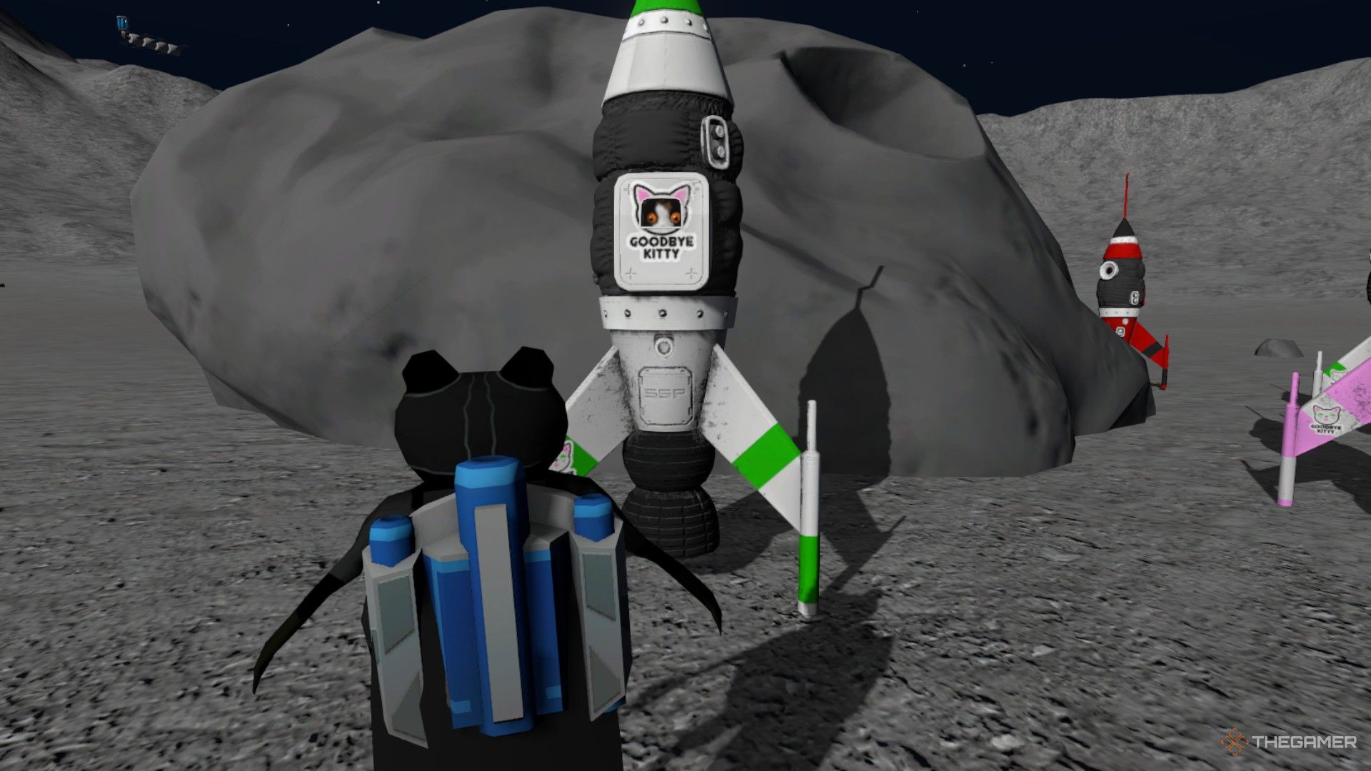 The player is standing in front of a small rocket with a cat inside it in Amazing Frog.