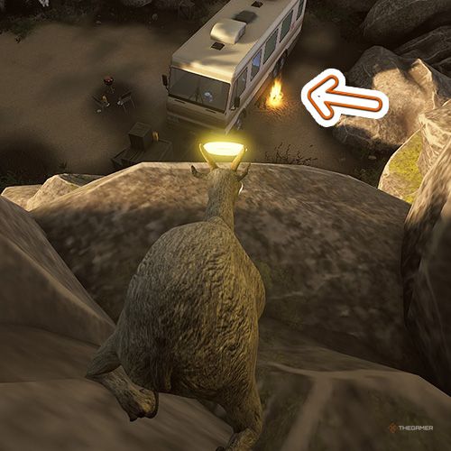 An orange arrow points the trophy that is behind a van from Breaking Bad series in Goat Simulator Remastered