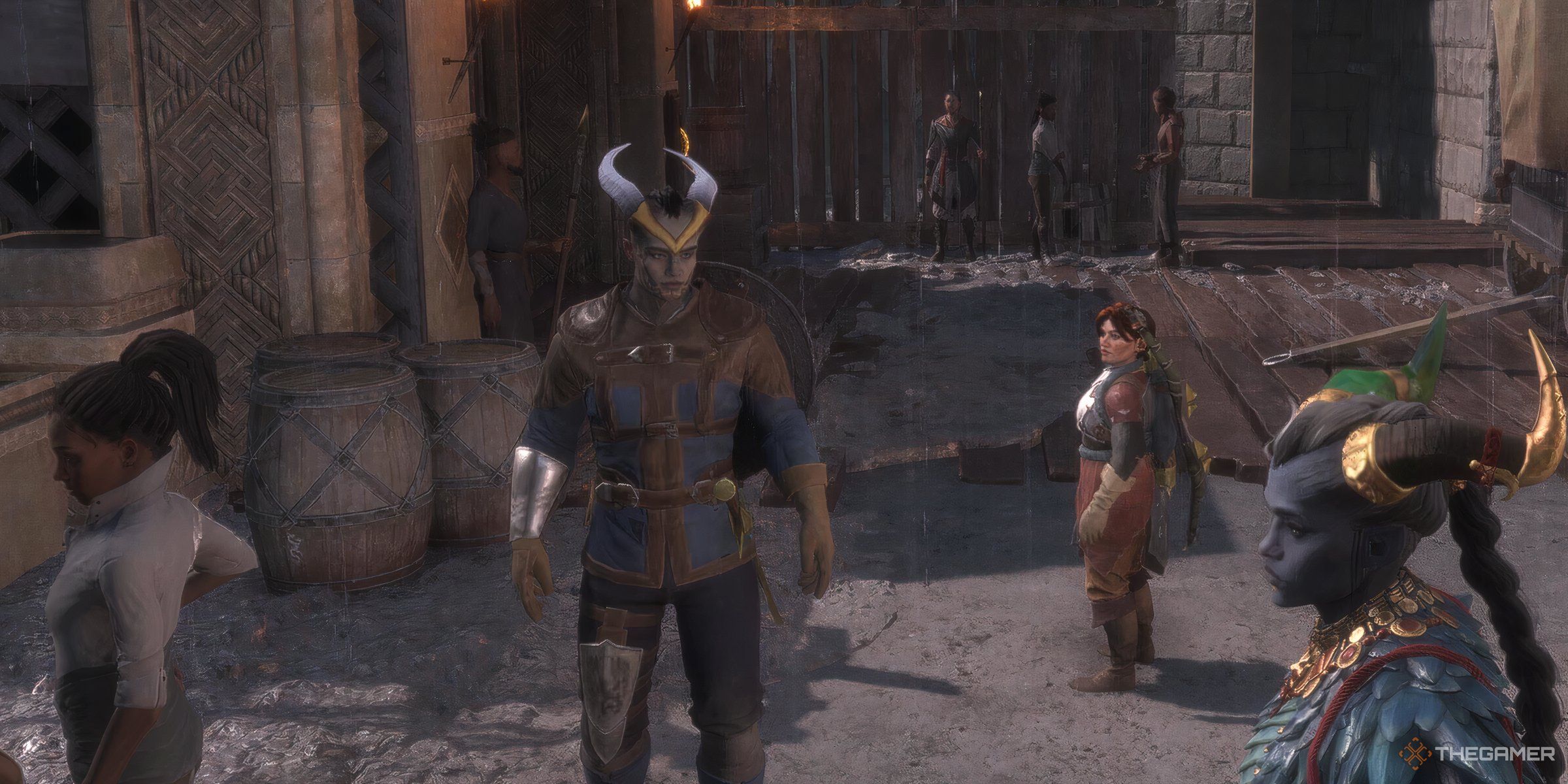 Rook, Harding, and Taash standing in a courtyard in Dragon Age: The Veilguard.