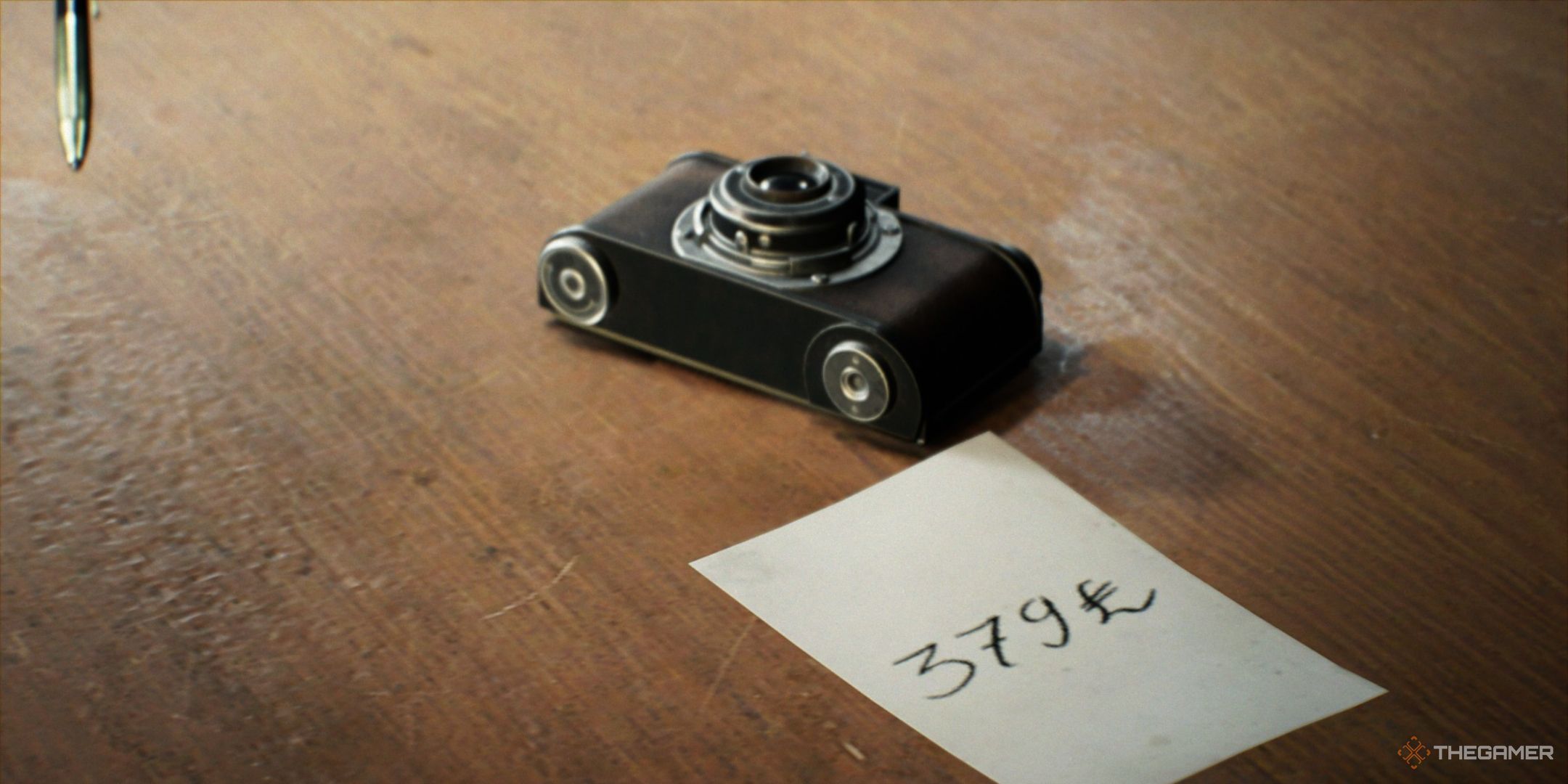 a handheld camera on a desk with a handwritten note pricing it at 379 lire in Indiana Jones And The Great Circle.