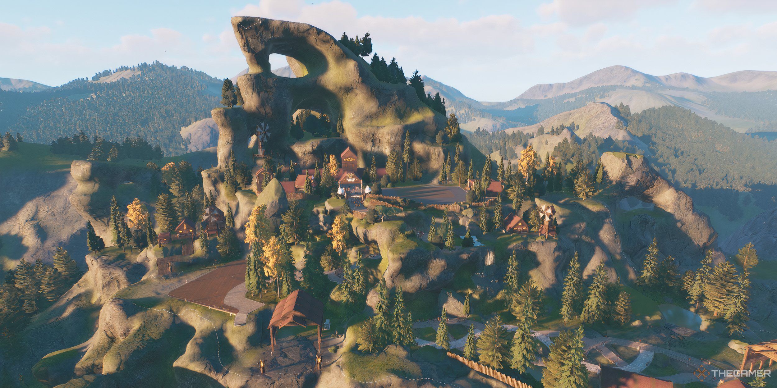 All Objectives In The Sky's The Limit Scenario در Planet Coaster 2 1 نمای هوایی از یک پارک تفریحی با تم وایکینگ در کوهستان.