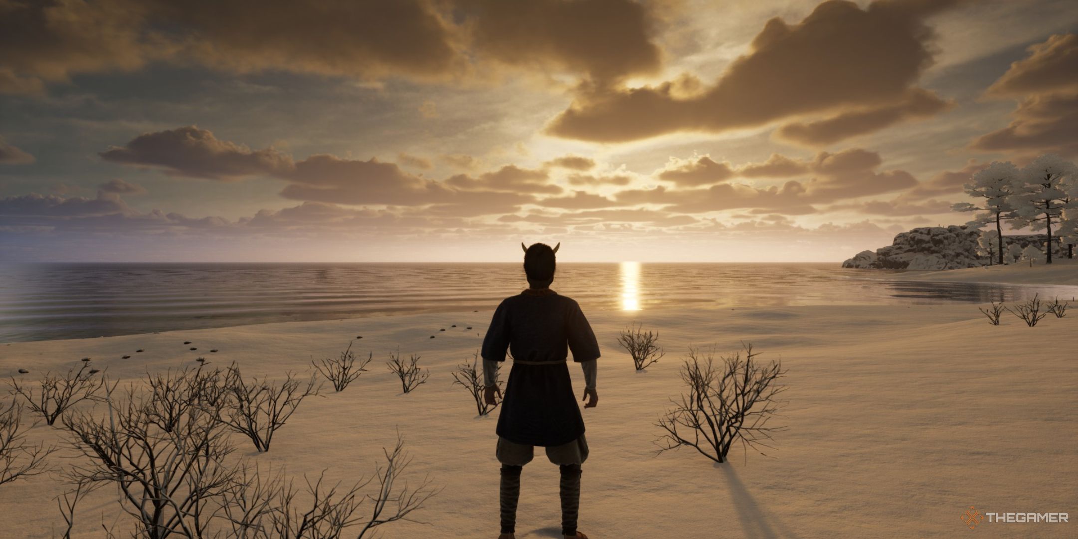 a player character watches the sunset on a snow-covered beach in sengoku dynasty.