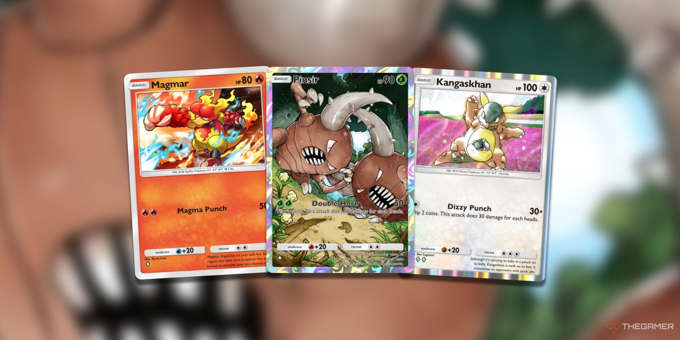 The strongest basic Pokemon in Pokemon TCG Pocket with Magmar, Pinsir and Kangashkan side by side. 