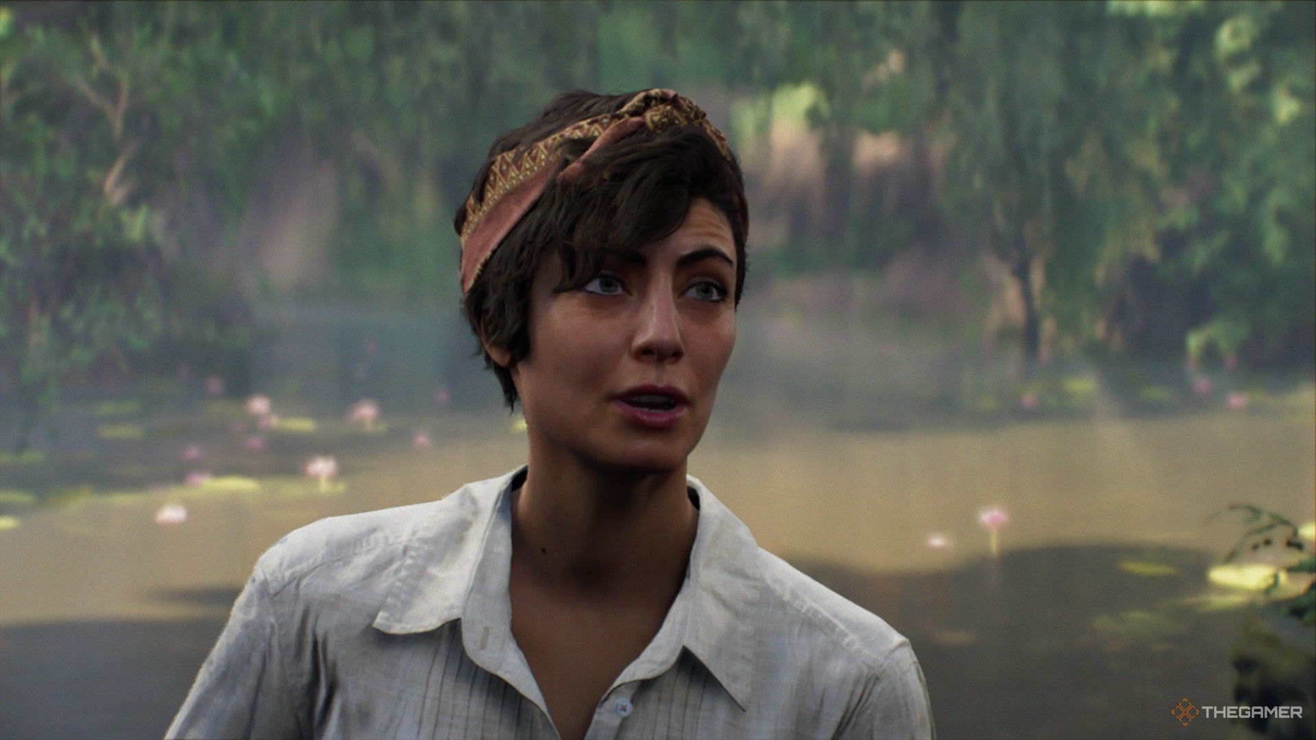 A closeup of Gina Lombardi in the Sukhothai jungle in Indiana Jones and the Great Circle.