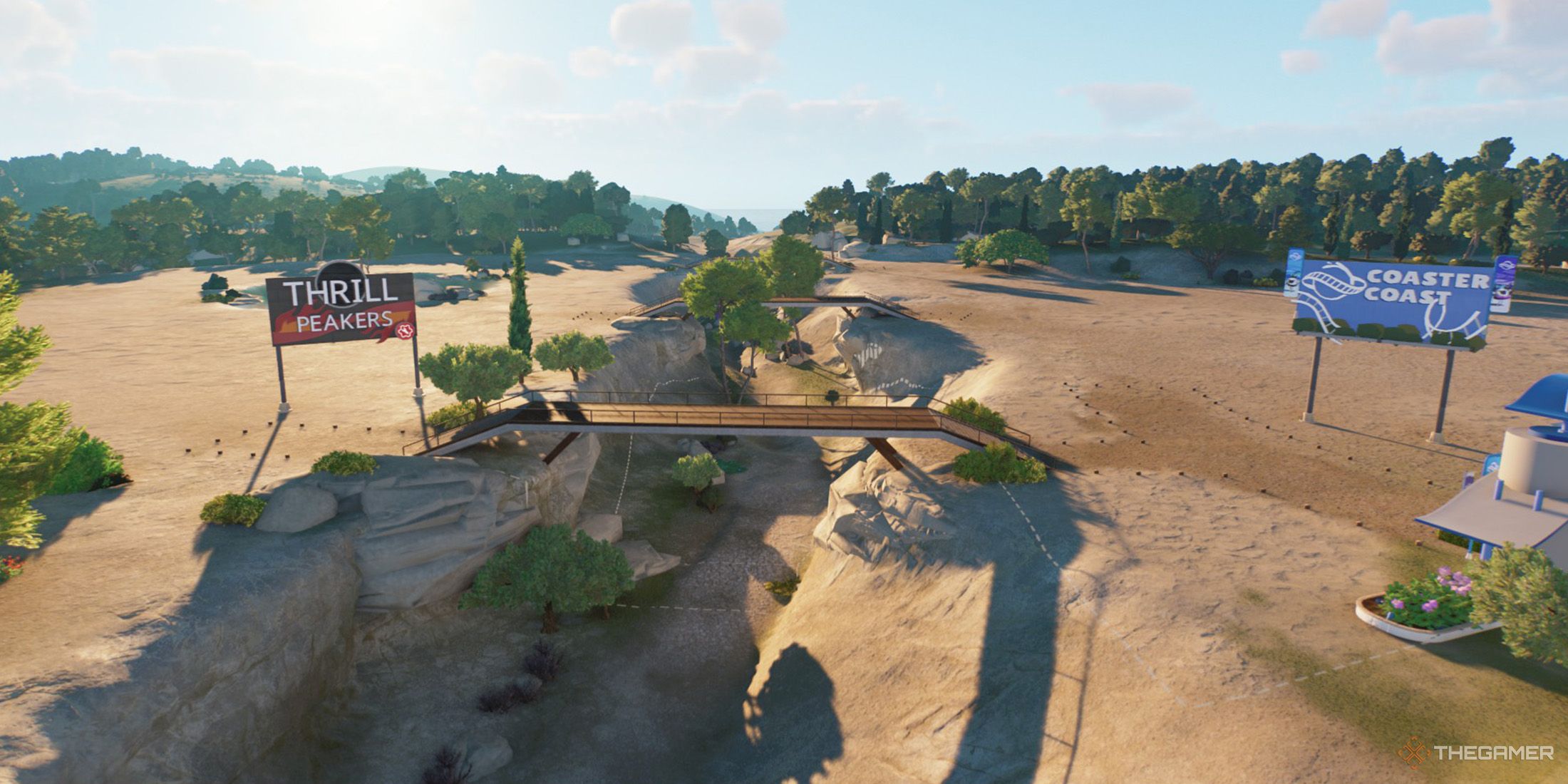 A scene from two different sides of a park, one side belongs to Thrill Peakers and other one belongs to Coaster Coast in Planet Coaster 2