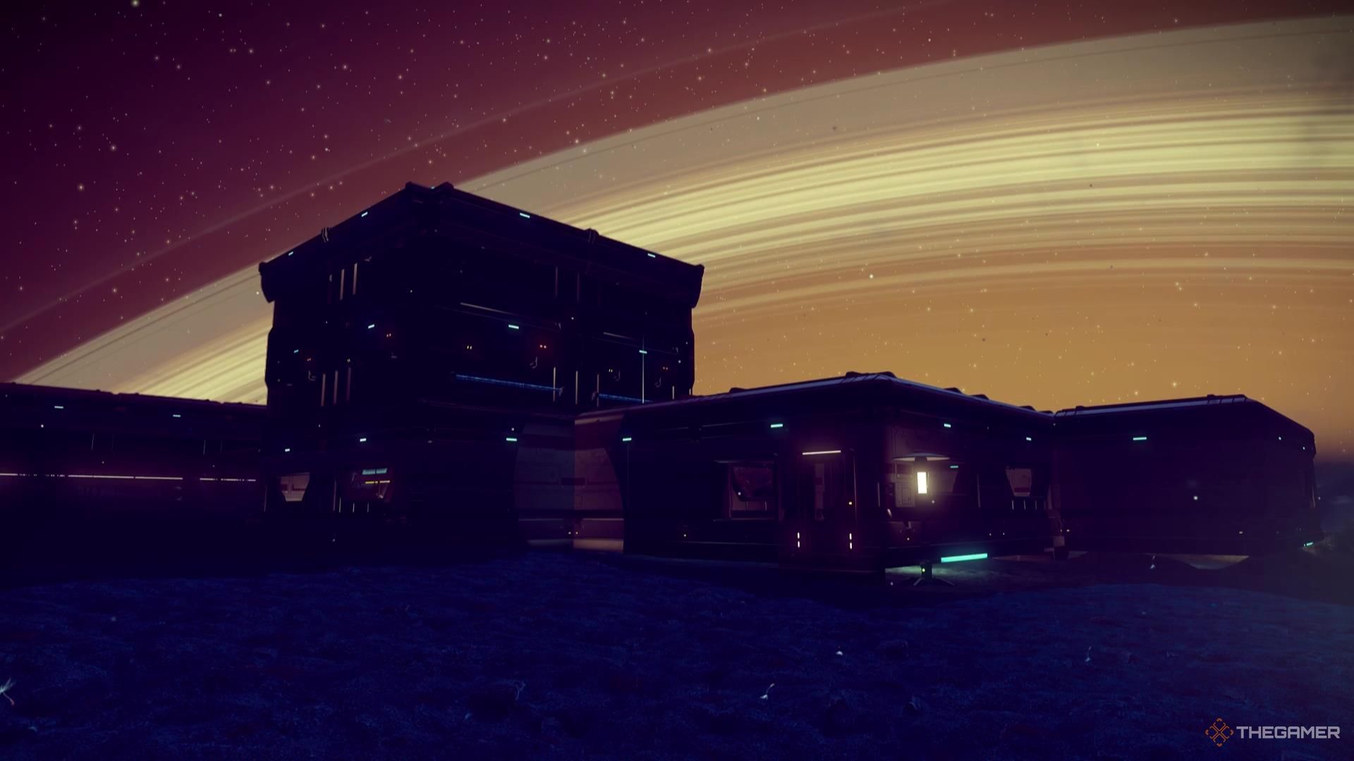 یک پایگاه کوچک در مقابل حلقه سیاره ای قرار دارد که بیشتر آسمان شب را در No Man's Sky اشغال می کند.