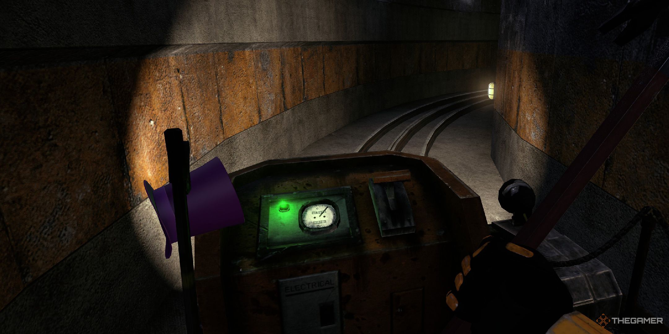 Black Mesa screenshot of the purple hat wedged between the lever and console of the On a Rail tram.