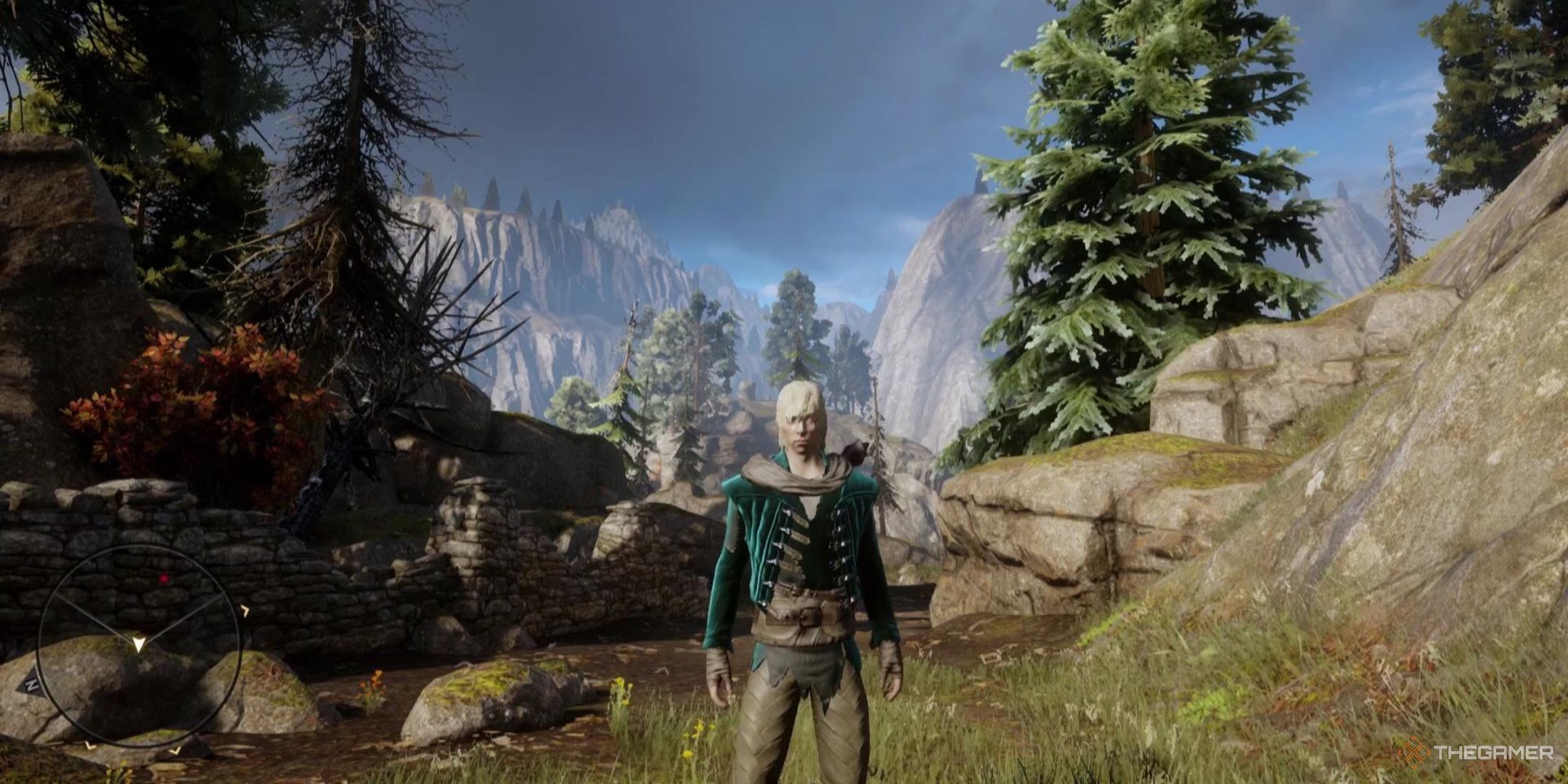 Cole stands wearing a quite dapper blue jacket in Dragon Age: Inquisition.