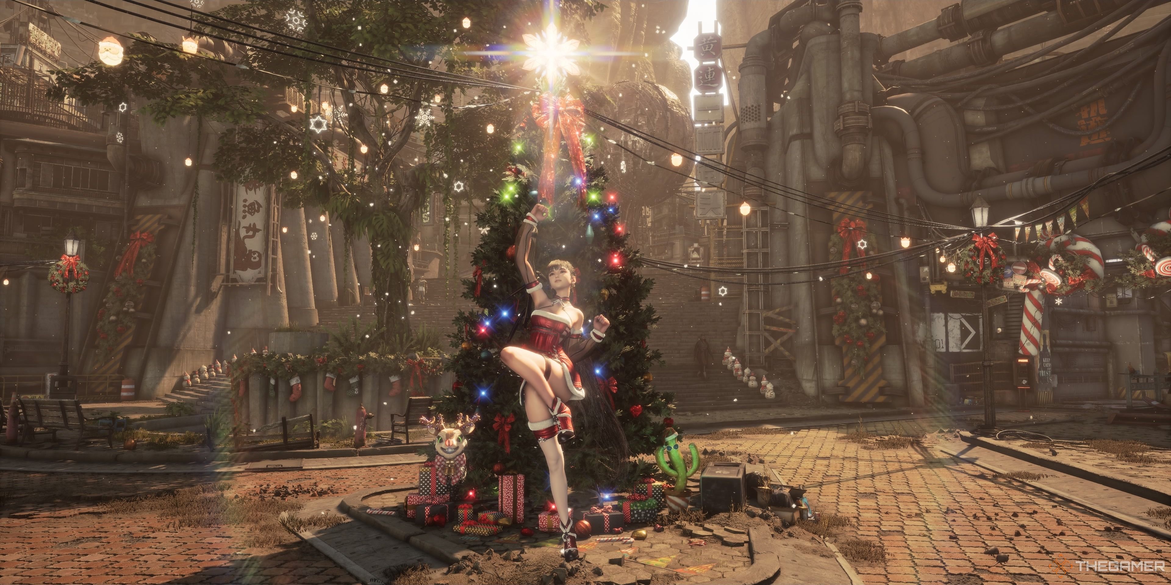 The image showcases the player jumping as Eve in Photomode in front of a Christmas tree with shimmering lights and a snowflake at the top. Eve is currently wearing her Santa Dress in the image.