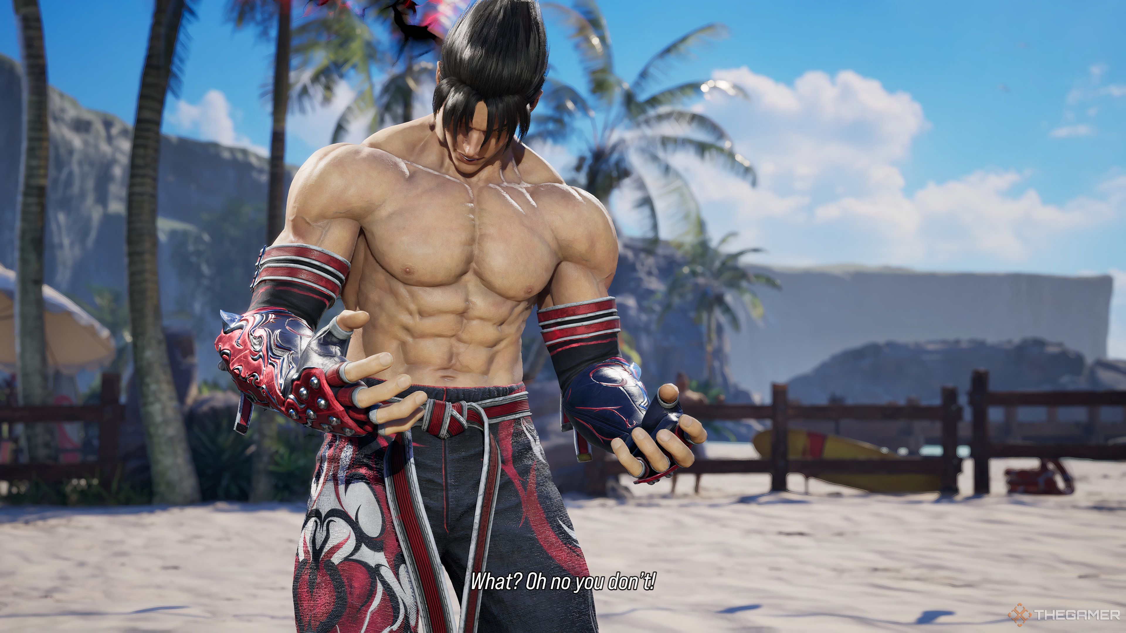 جین به دستانش در Tekken 8 نگاه می کند.
