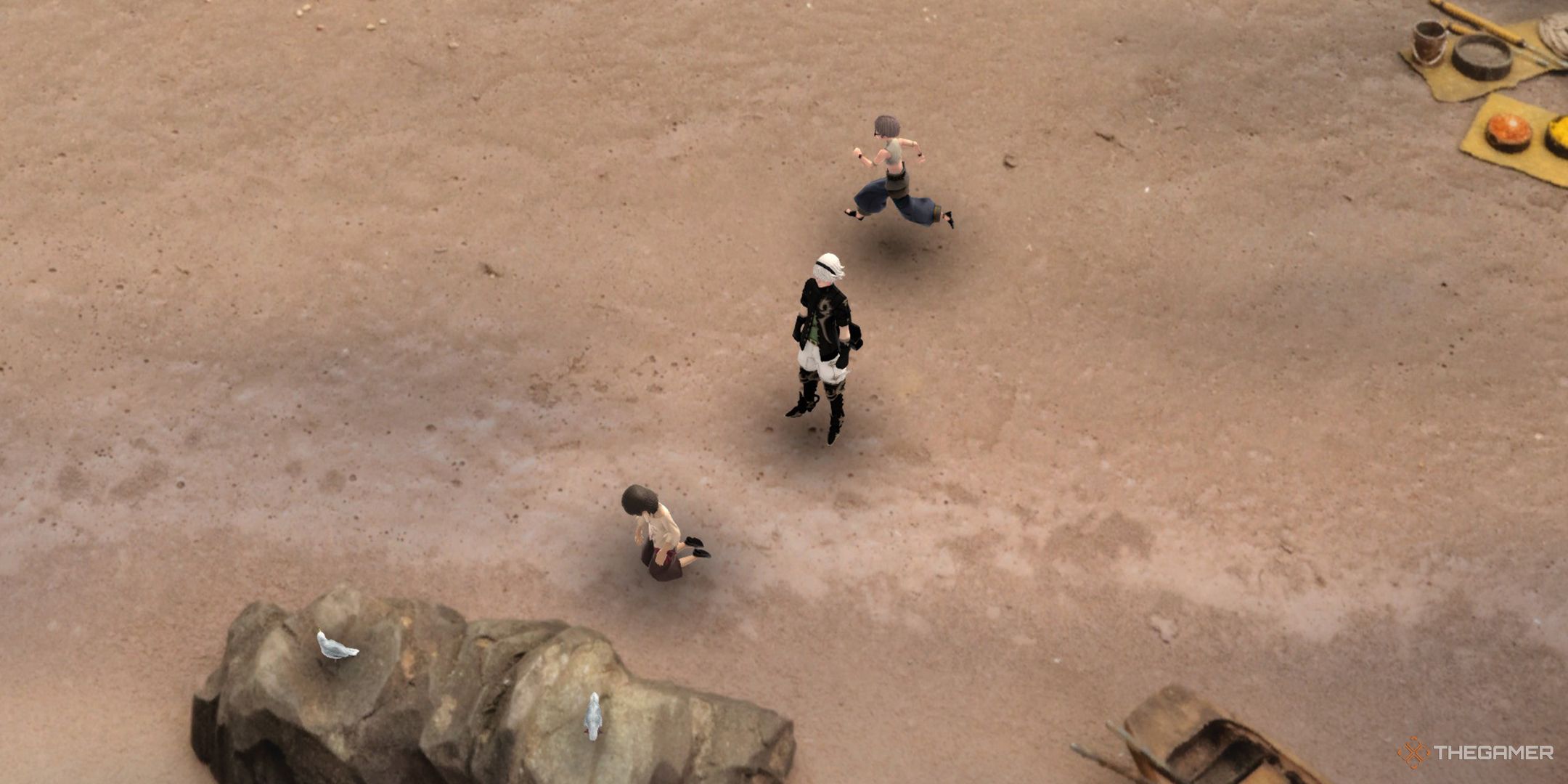 Leo standing on the beach as a girl looks for seashells and a boy runs nearby.