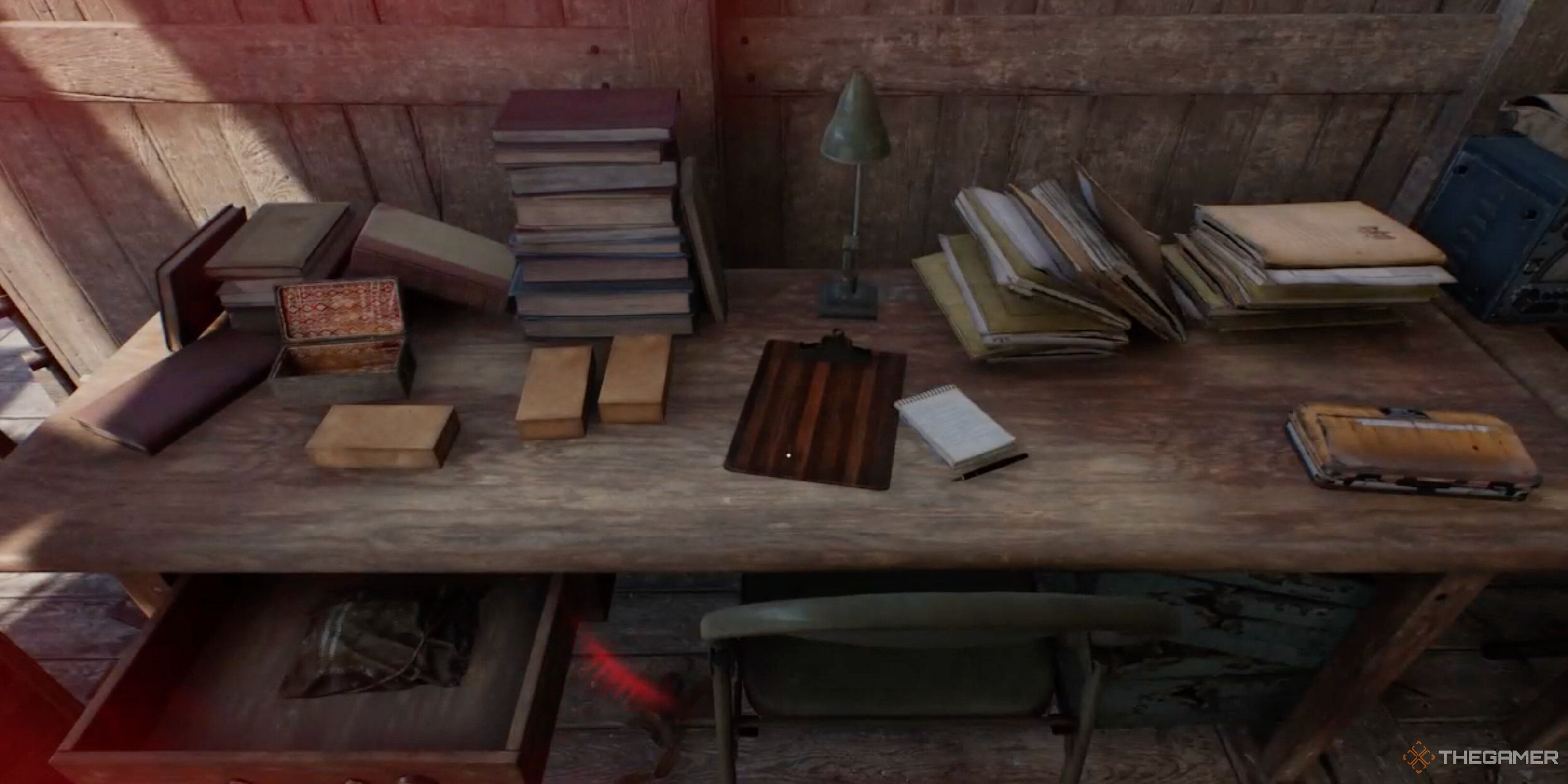 A desk with books on in Indiana Jones and the Great Circle.