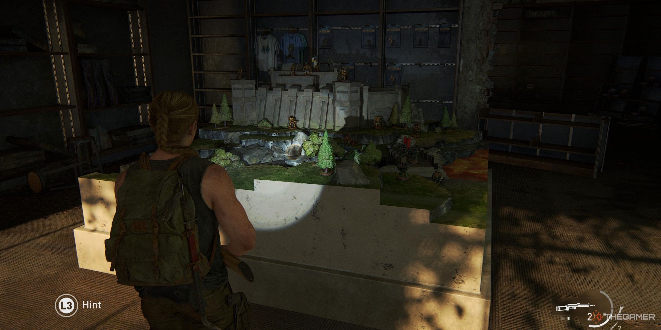 Abby coming across a Warhammer-like area in The Last of Us Part 2.