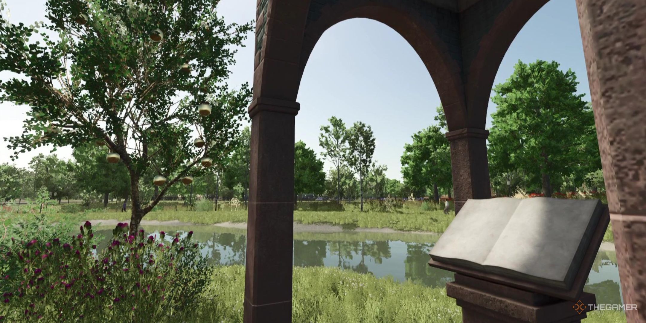 A tree full of golden apples sits just outside a pedestal sporting a stone book in Farming Simulator 25.