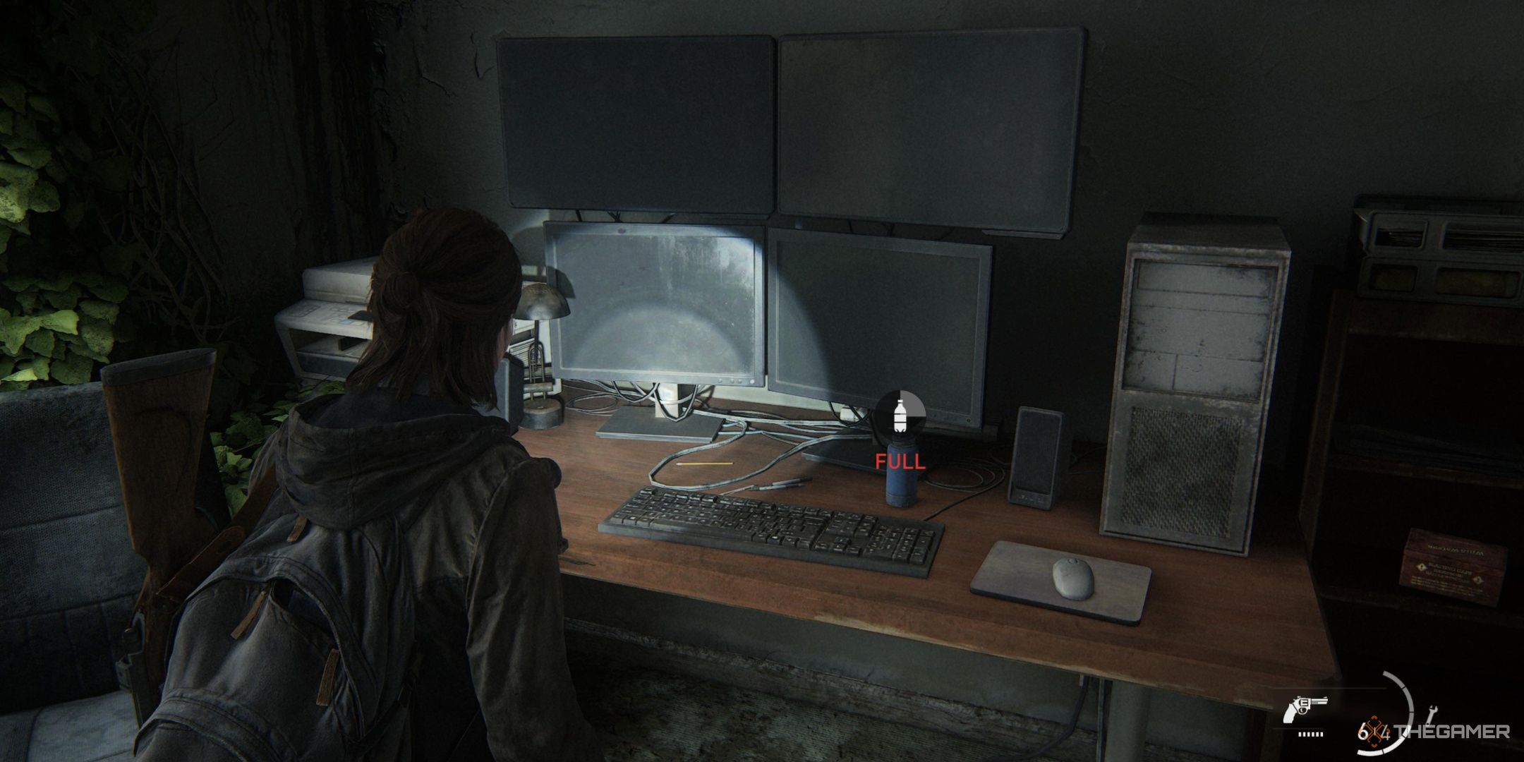 Ellie coming across a sweet dual monitor setup in The Last of Us Part 2.