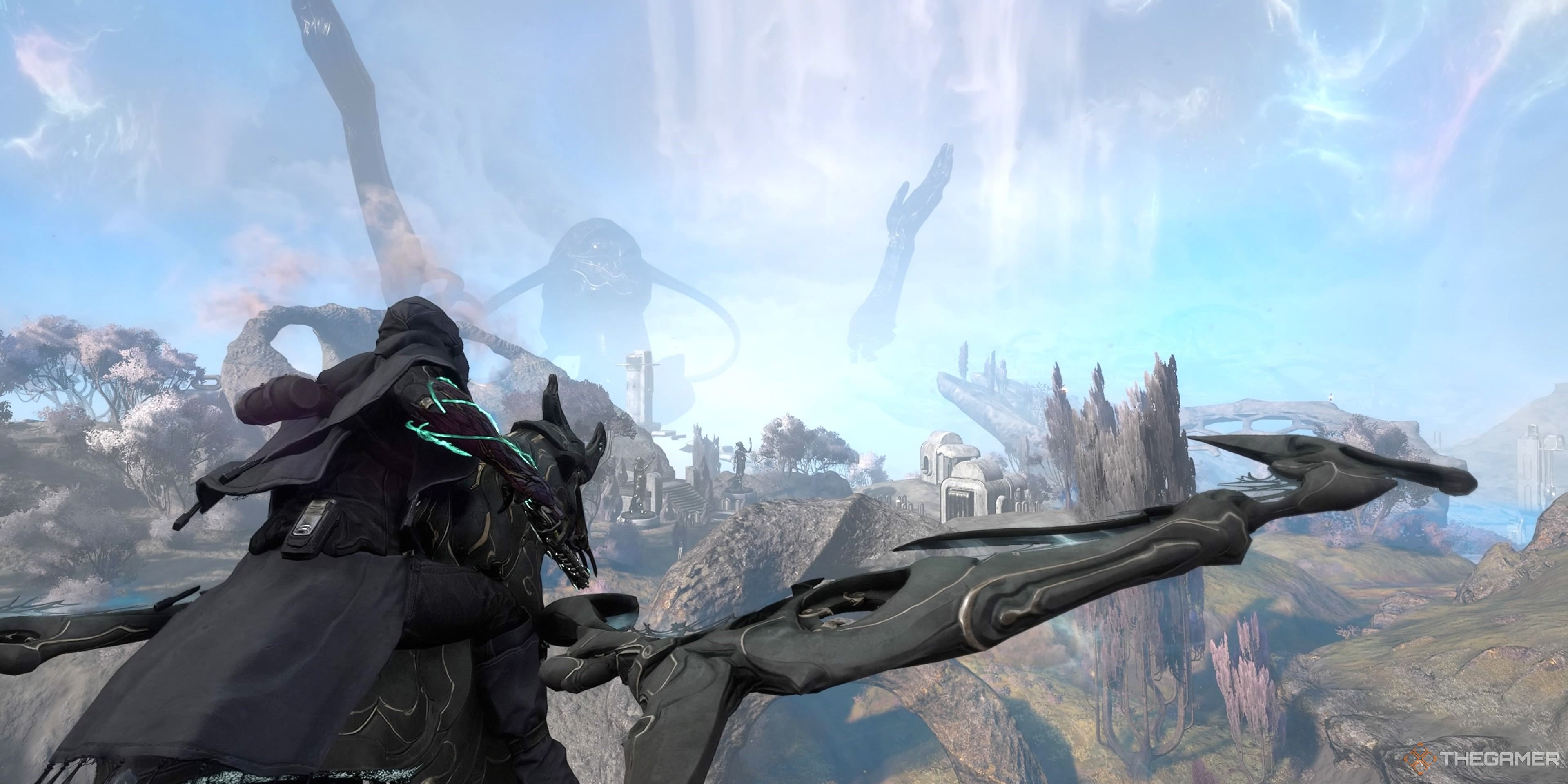 An image showcasing the player flying over the map of Duviri. Colour is visible throughout but sections of the land are slowly fading in colour. There is a large statue facing up to the sky with its arms outstretched in the background.