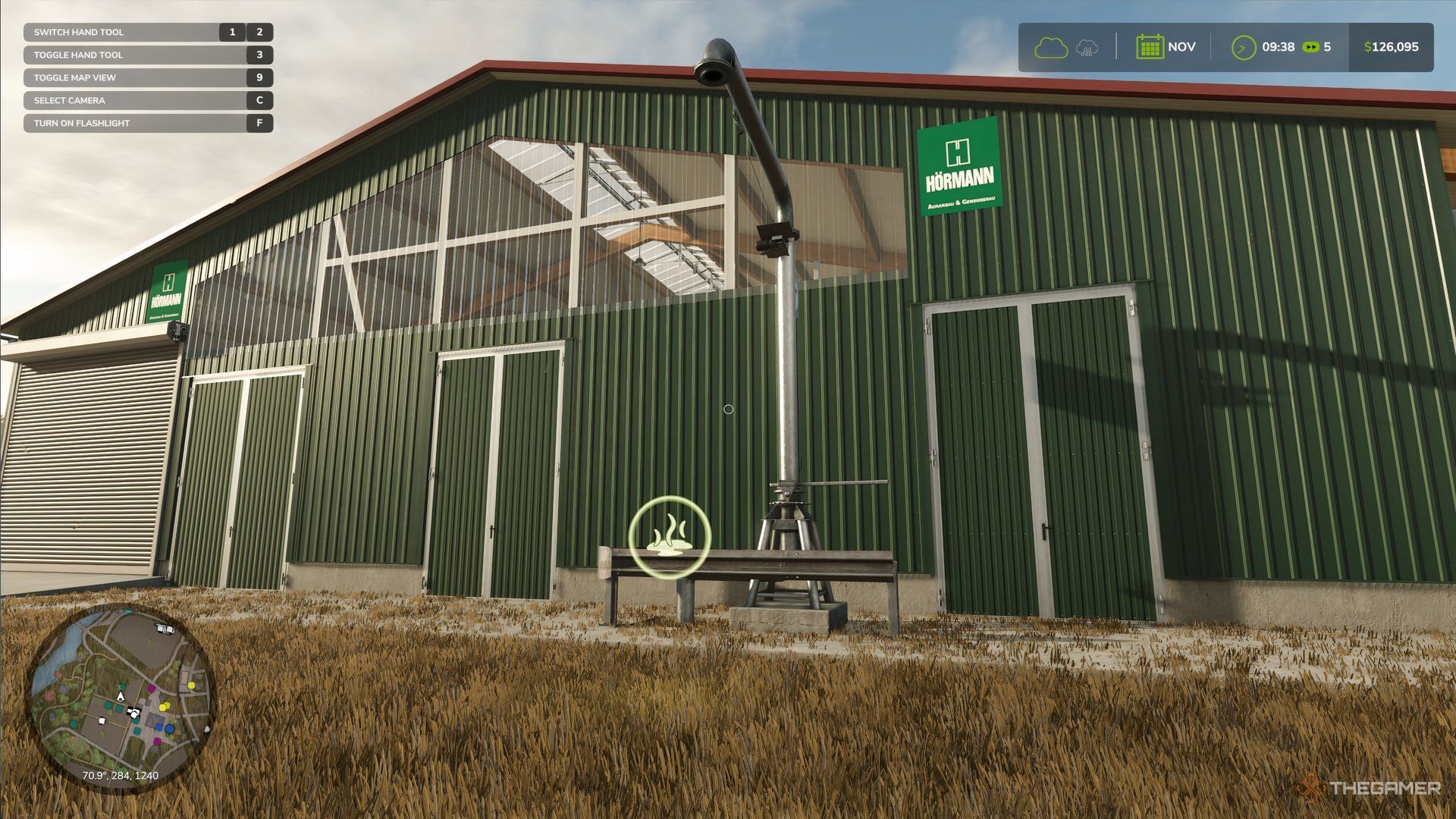 نماد دوغاب شناور در مقابل انبار گاو در Farming Simulator 25.