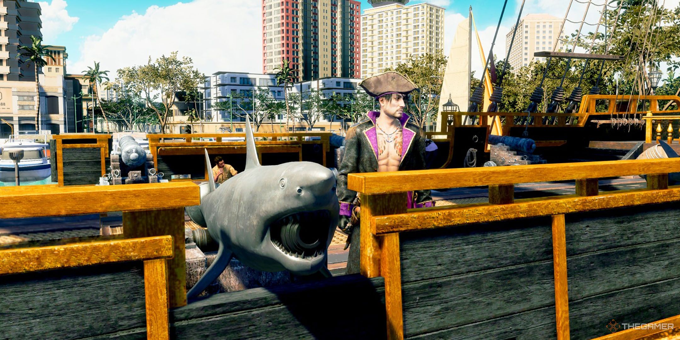 Majima beside a shark cannon in Like a Dragon Pirate Yakuza in Hawaii.