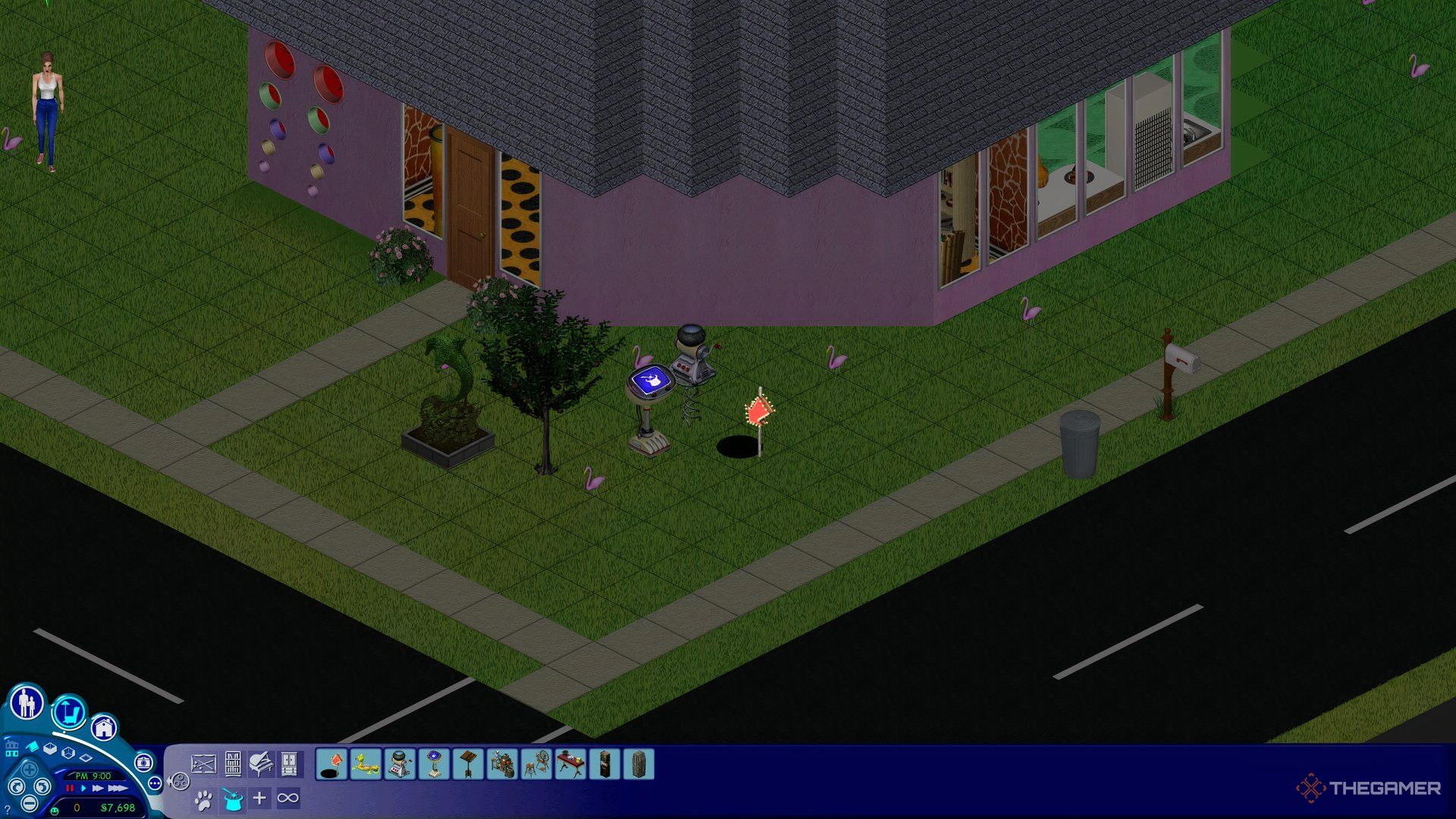 The magic items in The Sims Makin Magic, lined up outside of the Mashuga family&rsquo;s house.
