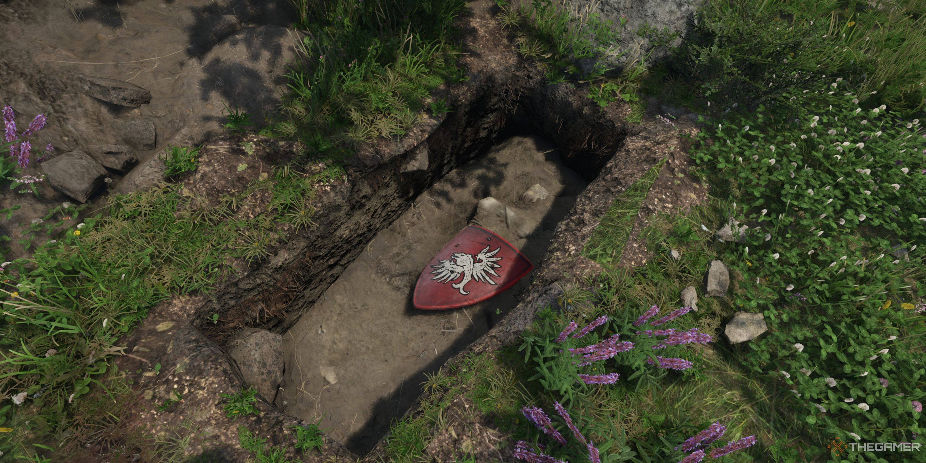 Henry standing in front of a grave with Von Bergow Knight Shield and a dead body inside.