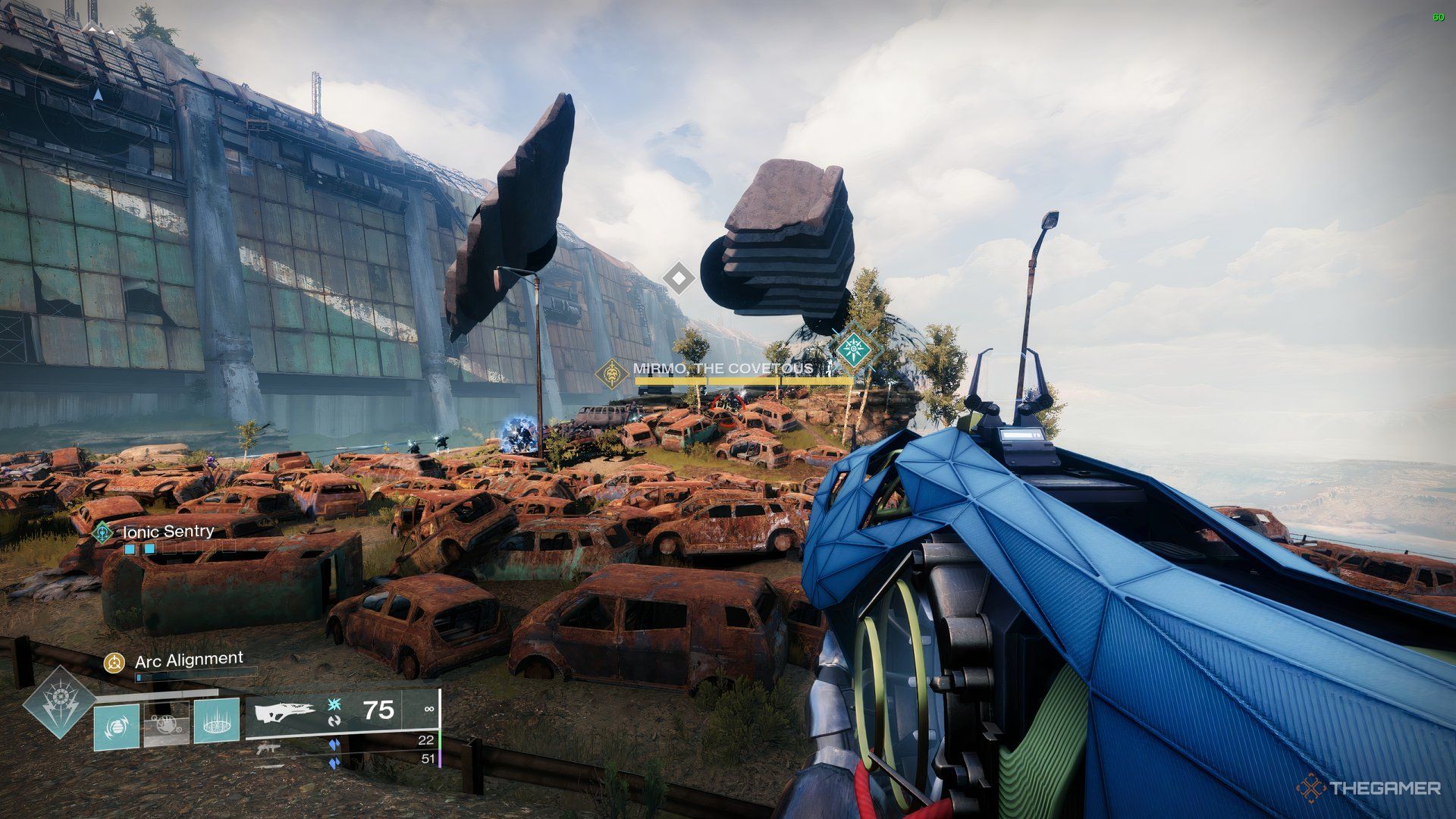 Guardian aiming at Mirmo, The Covetous amidst a cluster of rusty cars. This is the same place where the New Light Guardians start their campaign.
