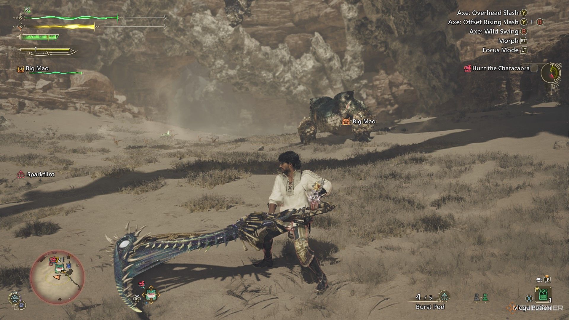 The image shows the Hunter using a Switch Axe to fight against a Chatacabra in Monster Hunter Wilds.