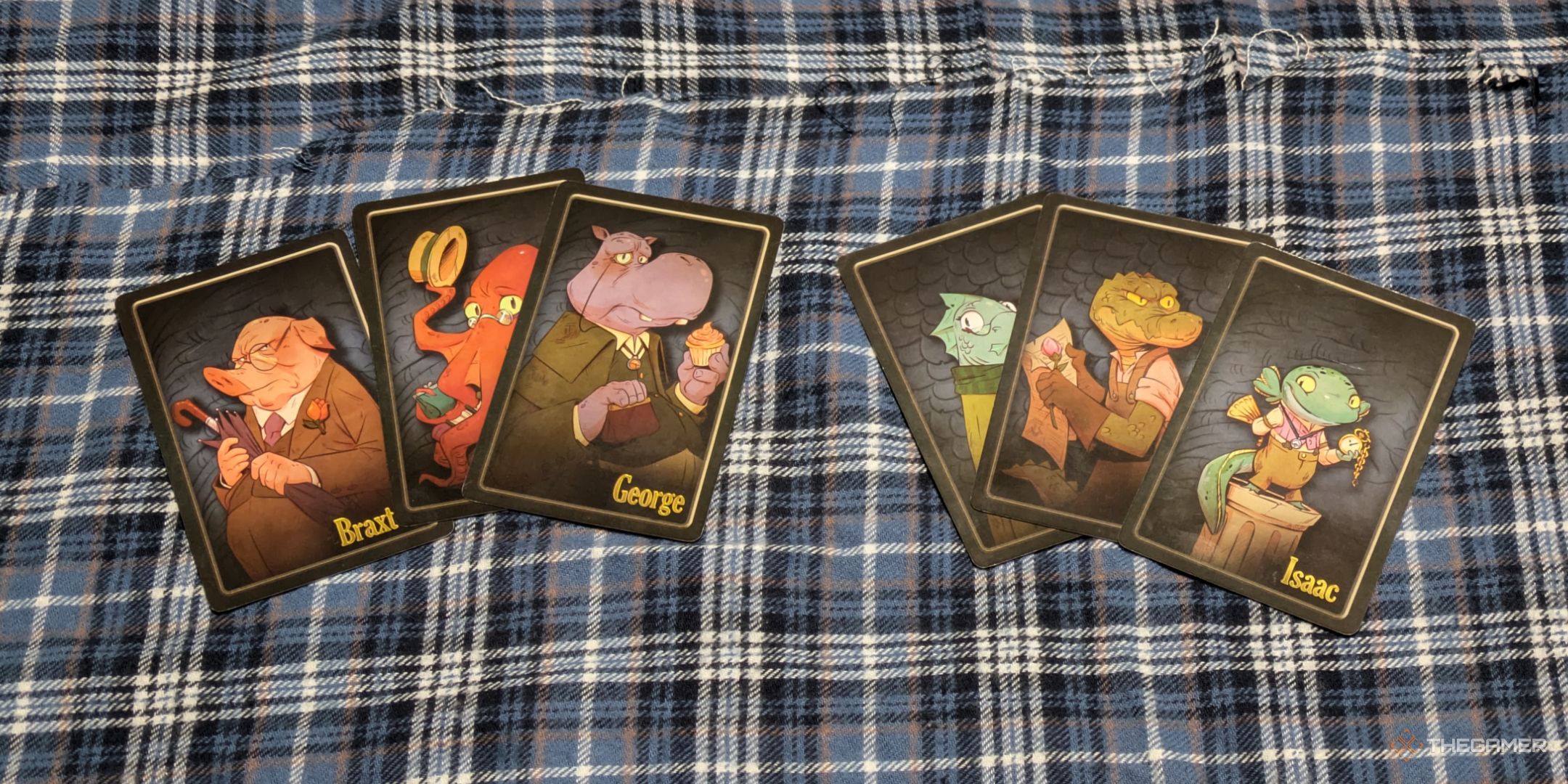 A photo of a spread of suspect cards in Five Minute Mystery.