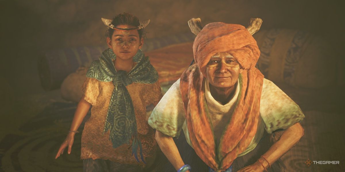 Elder Ela and a Kunafan child smile at the camera in Monster Hunter Wilds.