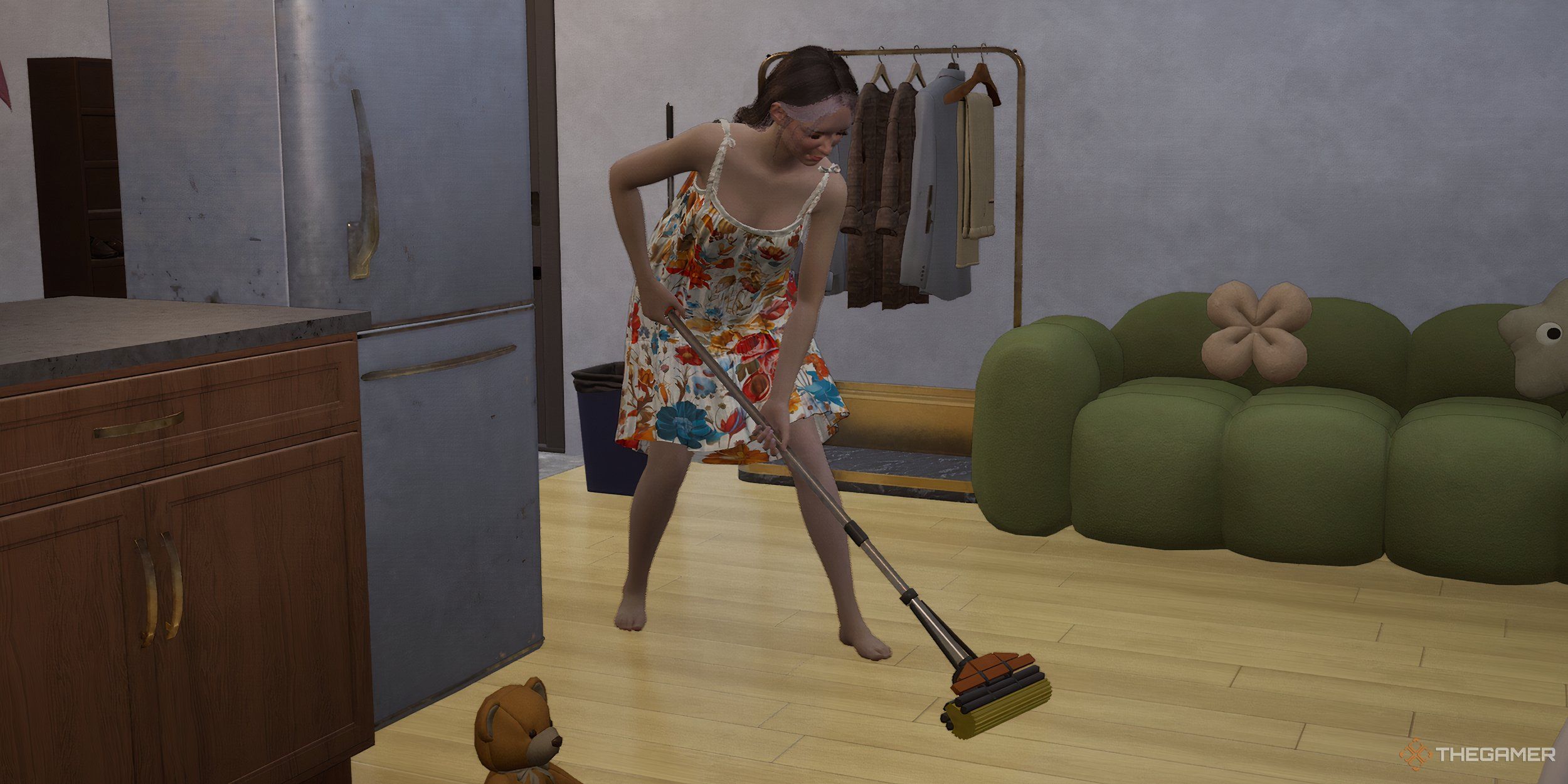 A woman mopping the floor of her apartment.