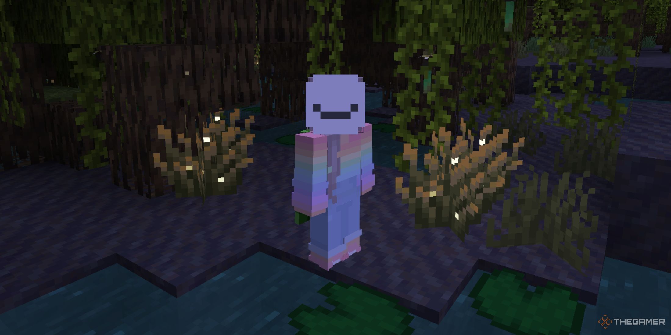 Minecraft character holding standing next to Firefly Bushes.