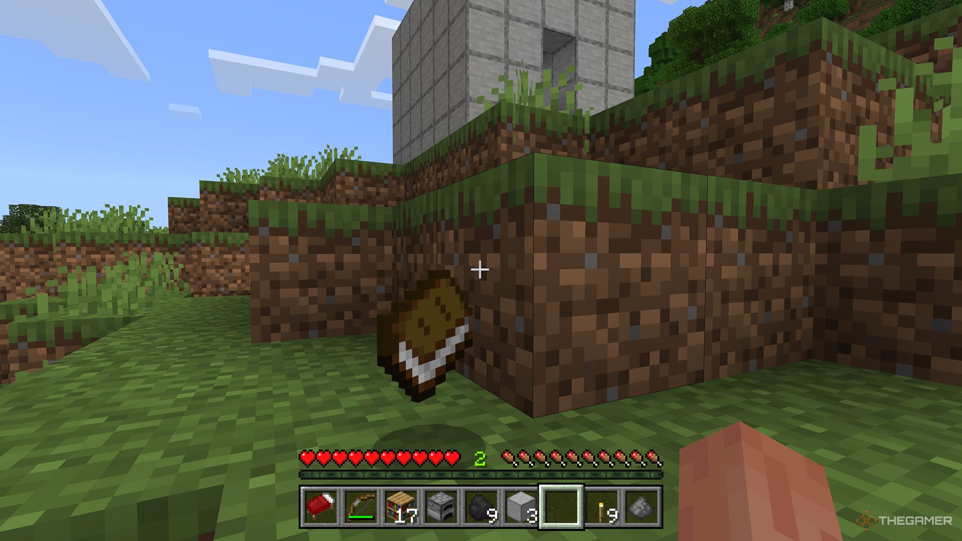 The player's mine craft screenshot is looking at a book that is on the floor.